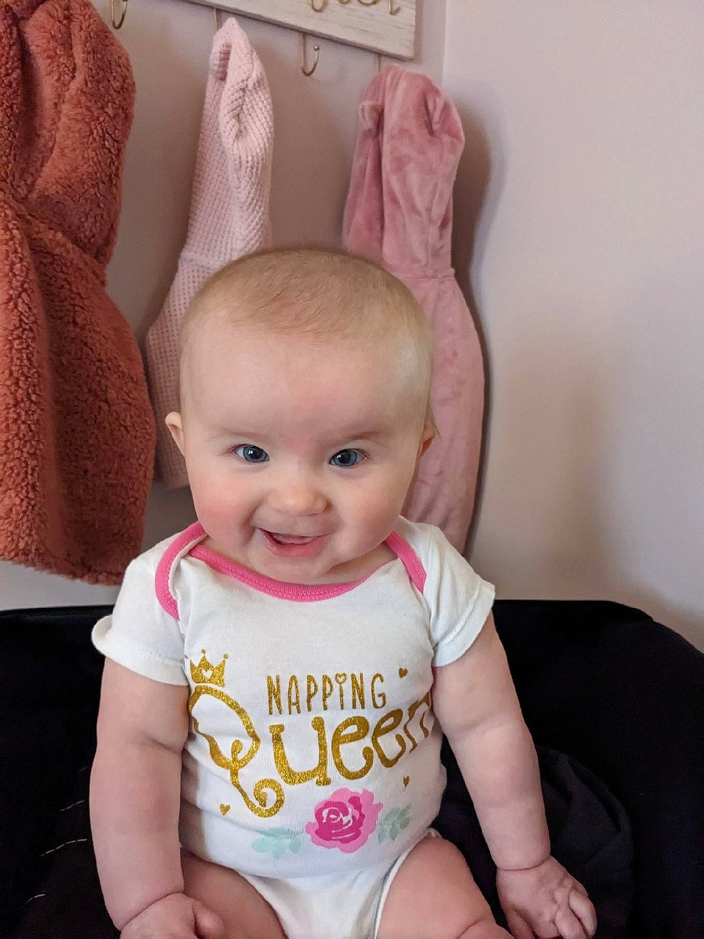Haven is registered to the contest to win money with this photo: baby, baby_products, baby_toddler_clothing, cheek, child, chin, eyelash, happy, joy, magenta, neck, person, pink, purple, sitting, skin, sleeve, smile, t_shirt, textile