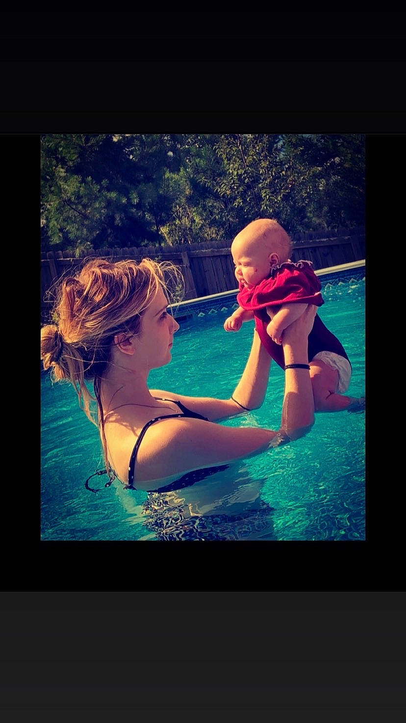 Everleigh Rose is registered to the contest to win money with this photo: beauty, blond, child, fun, happy, interaction, leisure, love, nose, person, photo_caption, photography, recreation, sky, smile, summer, swimming_pool, toddler, turquoise, vacation