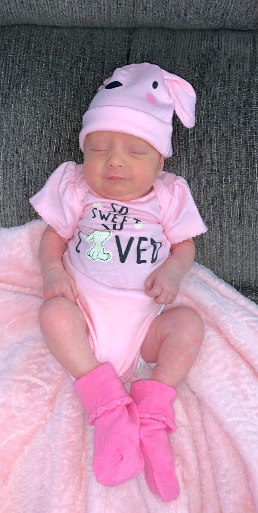 Everleigh is registered to the contest to win money with this photo: baby, baby_products, baby_toddler_clothing, child, headgear, headwear, infant_bodysuit, person, pink, product, toddler