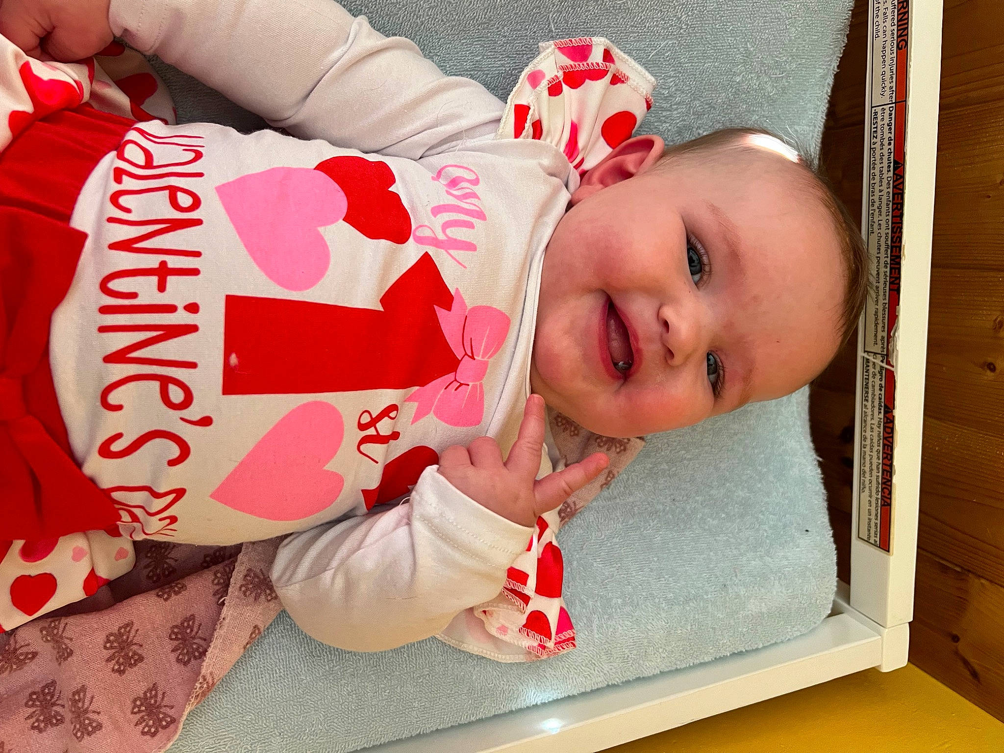 Aubrey joined the competition — help win amazing prizes! baby, baby_laughing, baby_toddler_clothing, carmine, cheek, child, event, flooring, happy, holiday, joy, pattern, person, picture_frame, product, rectangle, red, room, sleeve, smile