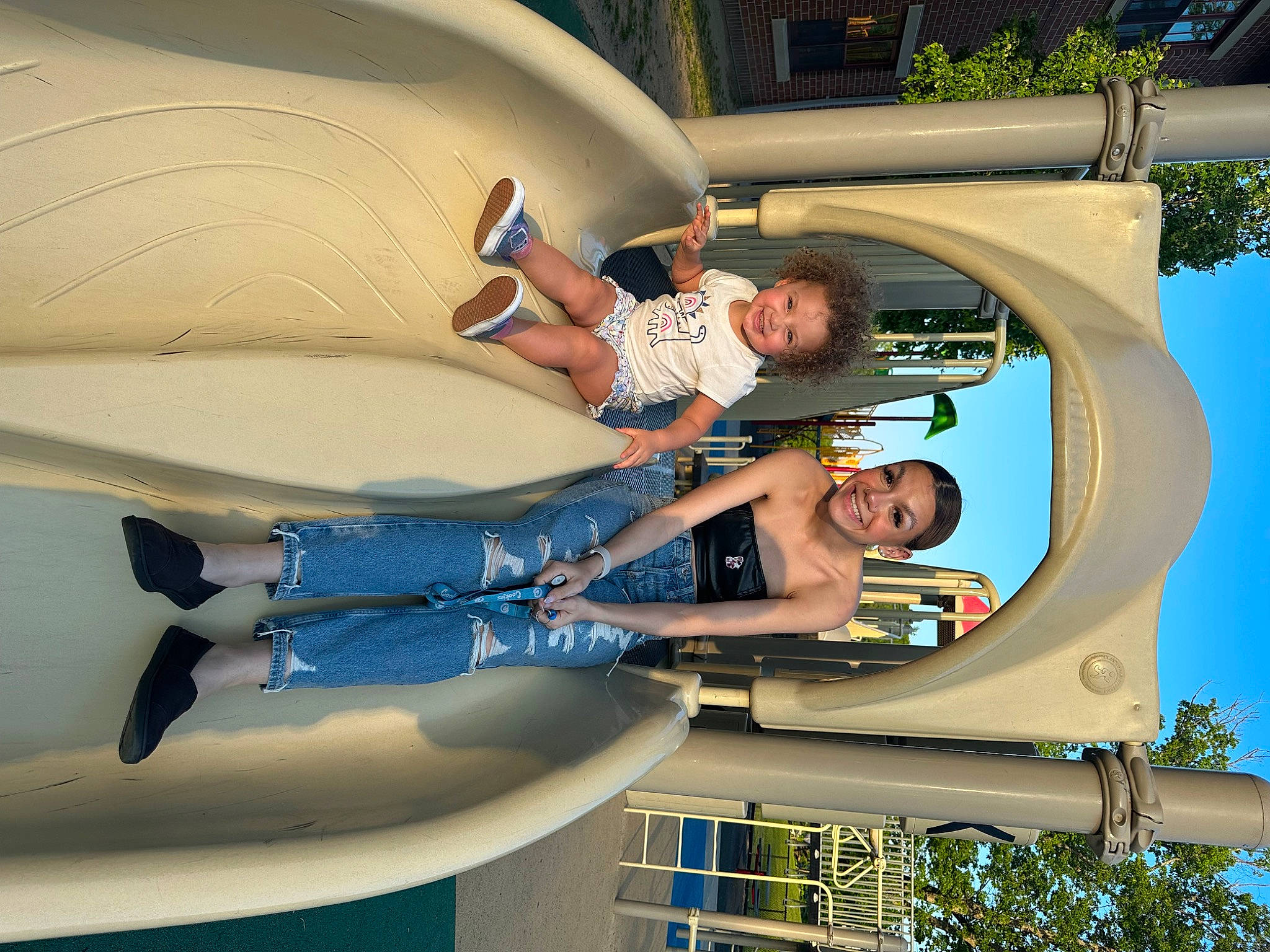 Luna-rose is registered to the contest to win money with this photo: automotive_exterior, comfort, electric_blue, fun, happy, human_leg, joy, leisure, person, recreation, shorts, sky, smile, t_shirt, thigh, toddler, vacation