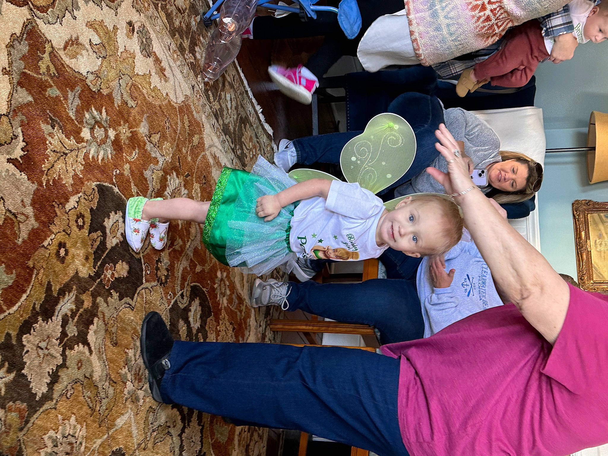 Paisleigh is registered to the contest to win money with this photo: arm, baby, child, event, food, fun, happy, hat, headwear, joy, leisure, person, play, recreation, sitting, sneakers, soil, t_shirt, toddler, tree