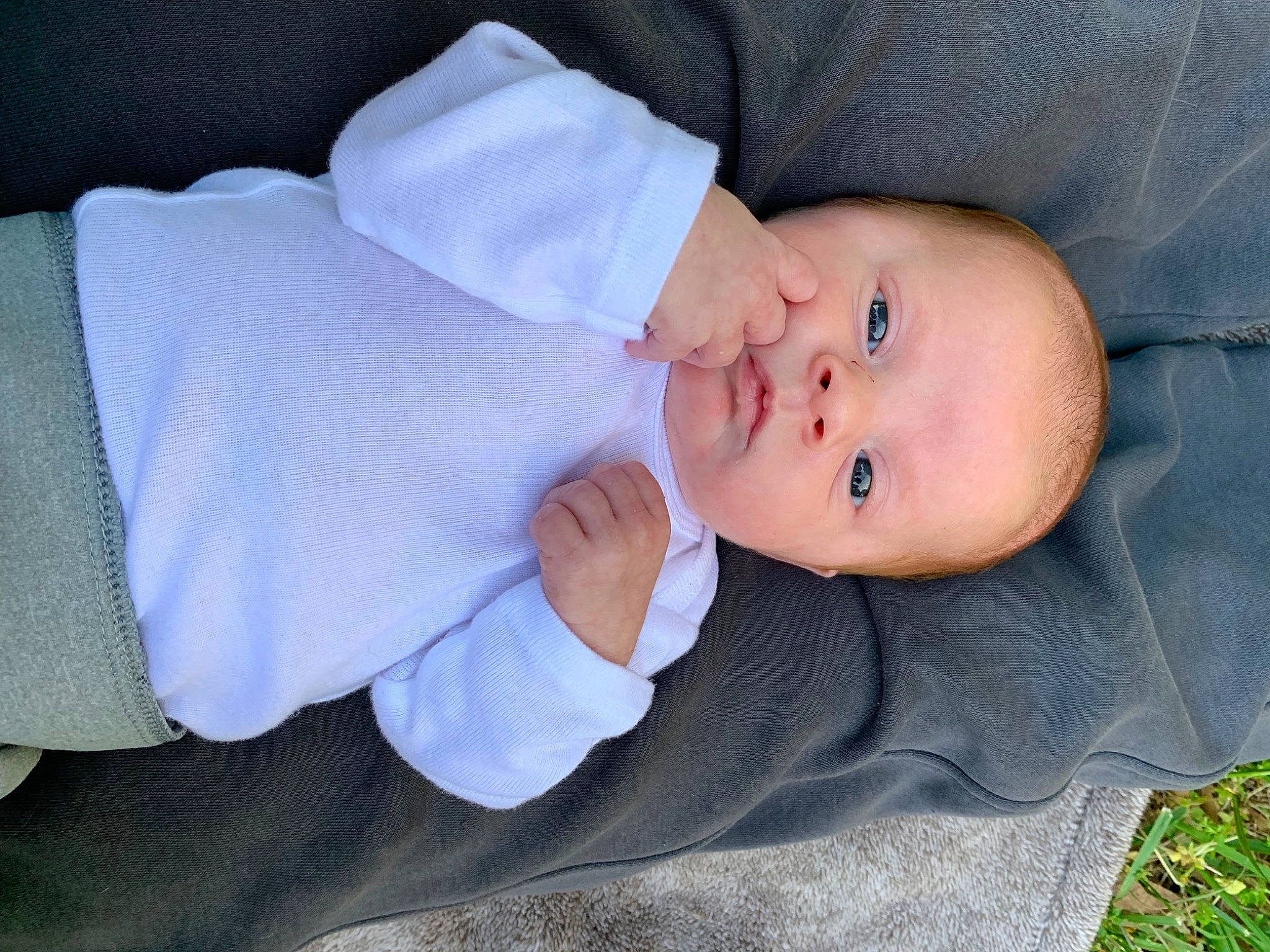 Scarlett joined the competition — help win amazing prizes! baby, baby_products, baby_toddler_clothing, child, collar, comfort, eye, grass, hat, headgear, iris, lip, person, portrait_photography, sitting, sleeve, smile, sun_hat, toddler