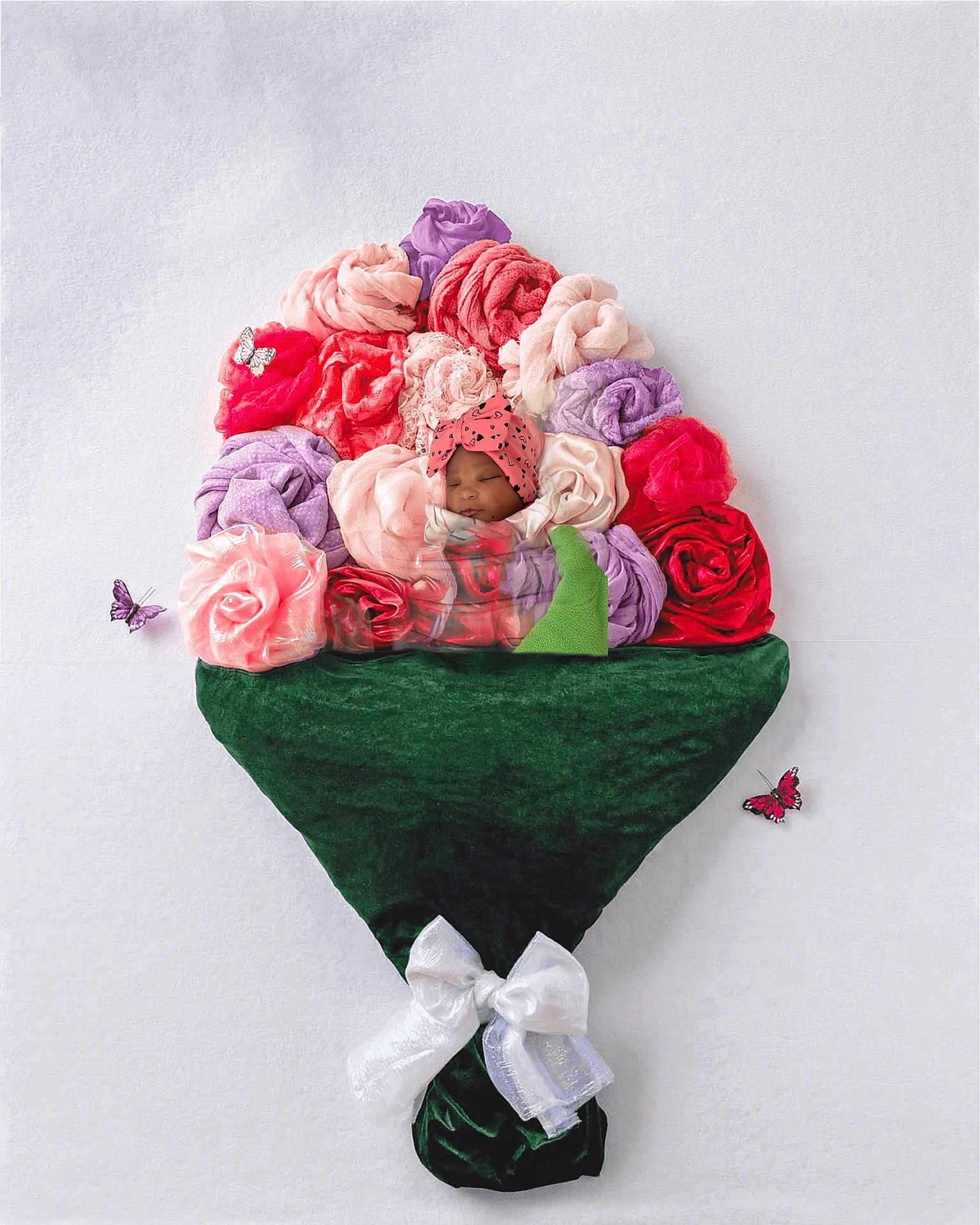 Nyurri joined the competition — help win amazing prizes! baby, sleeping, fabric_flowers, bouquet, blanket, headwear, butterfly, green_cloth, white_bow, soft_texture, pink, red, purple, pastel_colors, wrapped, cute, infant, creative_photography, portrait, flower_bed
