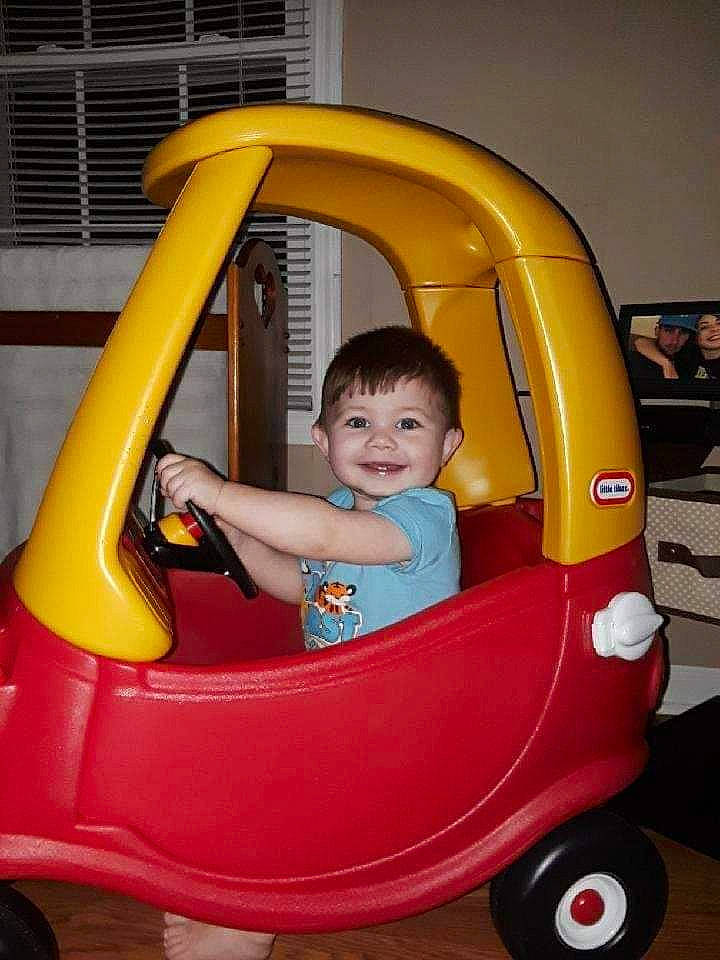 Braxton joined the competition — help win amazing prizes! baby_products, baby_toys, child, fun, joy, person, play, product, riding_toy, toddler, toy, vehicle, yellow