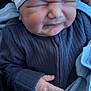 Muhammad Ali joined the competition — help win amazing prizes! baby, newborn, infant, hat, striped_hat, clothing, sweater, blanket, hand, face, expression, wrinkles, skin, person, cute, sleepwear, warm, cozy, portrait, indoors