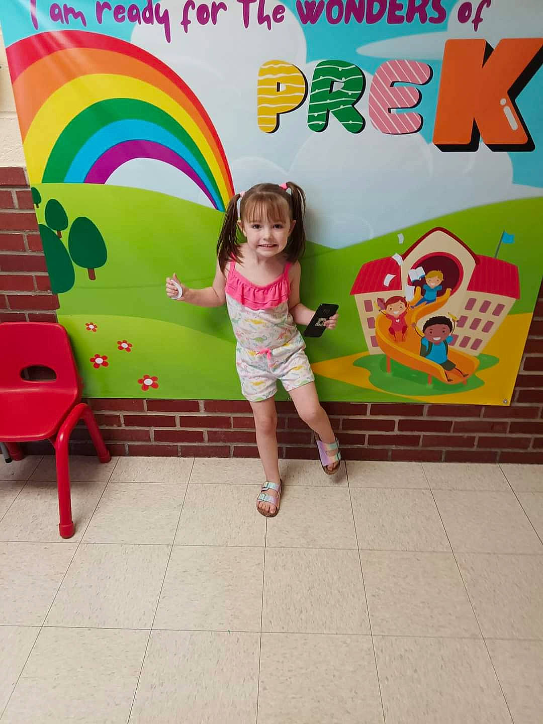 Abigail joined the competition — help win amazing prizes! automotive_wheel_system, baby_toddler_clothing, child, font, fun, green, happy, joy, leisure, magenta, pattern, person, pink, rainbow, sandal, shorts, smile, summer, t_shirt, toddler