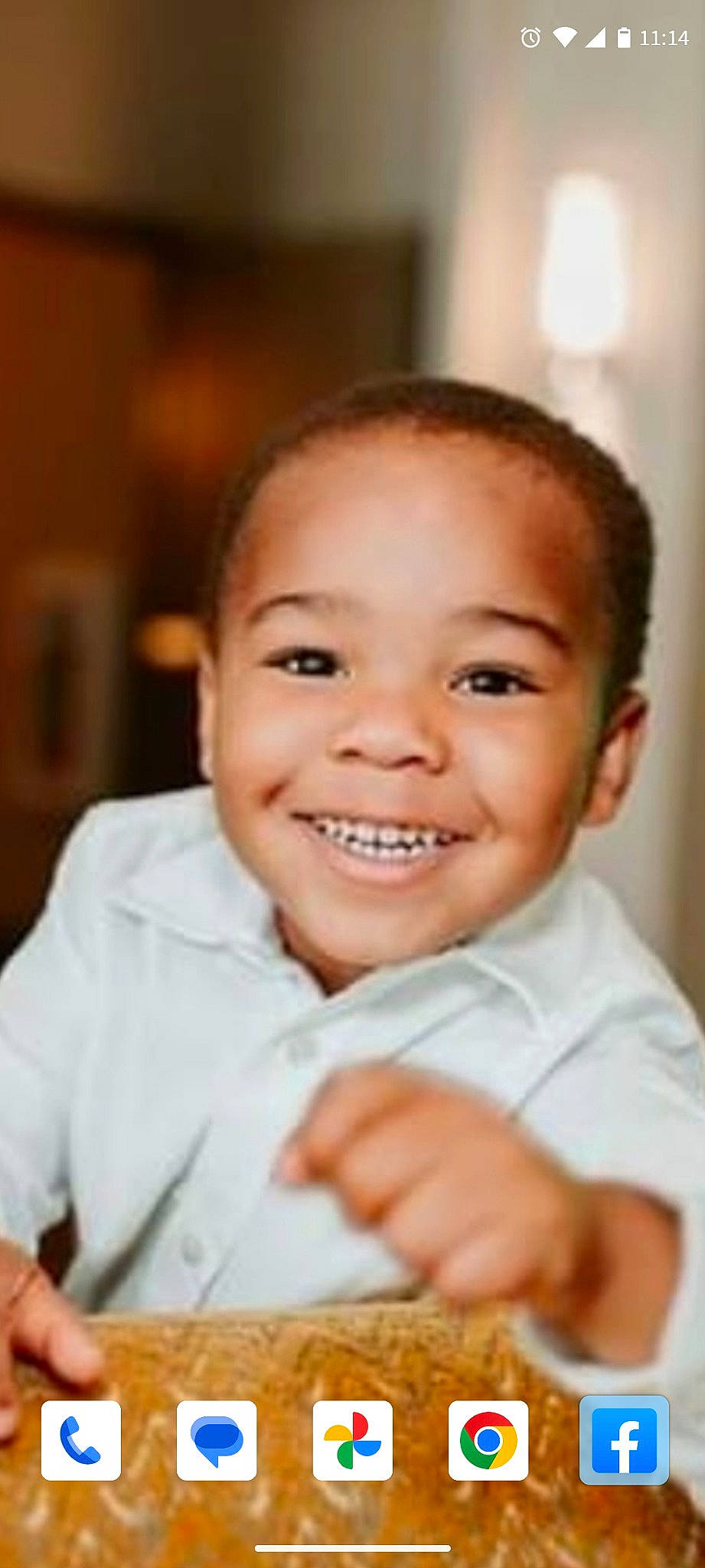 William is registered to the contest to win money with this photo: baby, cheek, child, ear, eye, eyebrow, finger, flash_photography, forehead, gesture, happy, iris, joy, lip, mouth, nose, person, skin, sleeve, smile