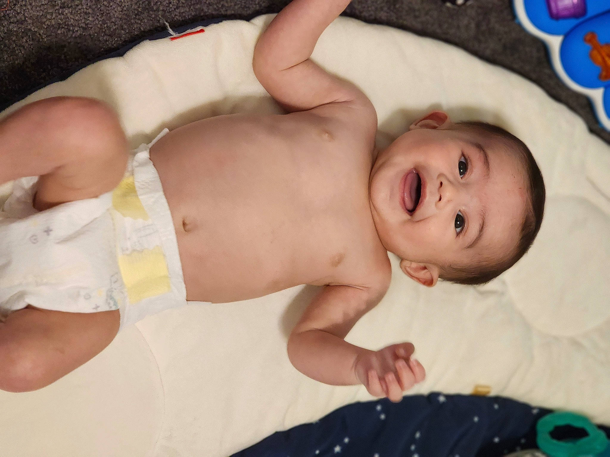 Daniel is registered to the contest to win money with this photo: abdomen, baby, baby_products, cheek, chest, comfort, diaper, eye, face, finger, happy, head, linens, mouth, person, skin, smile, stomach, thigh, toddler