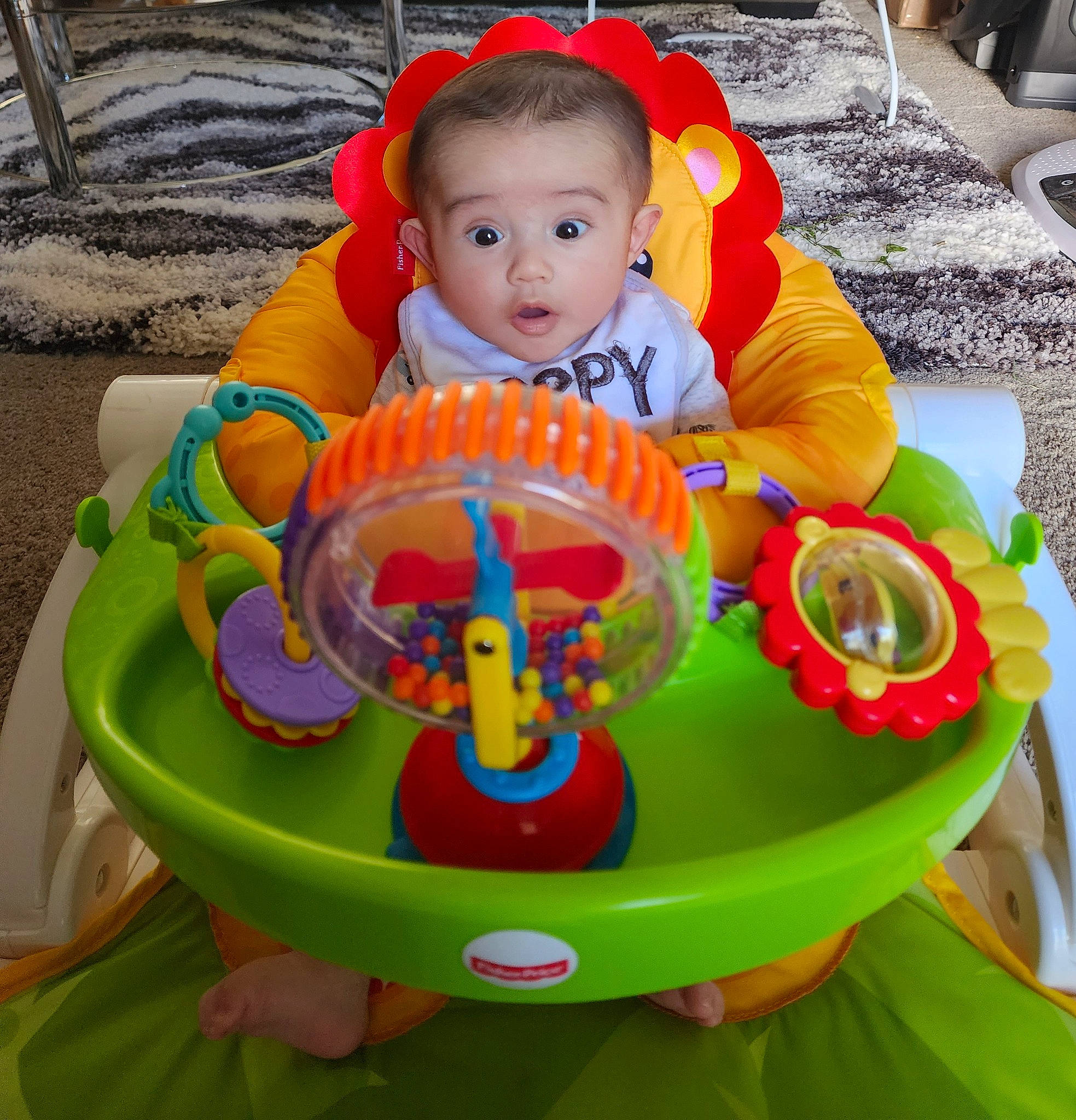Daniel joined the competition — help win amazing prizes! baby, baby_mobile, baby_playing_with_toys, baby_products, baby_toddler_clothing, baby_toys, chair, child, circle, fun, happy, head, leisure, person, plastic, recreation, riding_toy, sharing, sitting, surprise