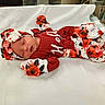 Rosalie is registered to the contest to win money with this photo: newborn, baby, sleeping, infant, portrait, hospital, blanket, floral, roses, red_clothing, hat, mittens, swaddled, peaceful, indoors, bed, medical_equipment, nursery, photography, child
