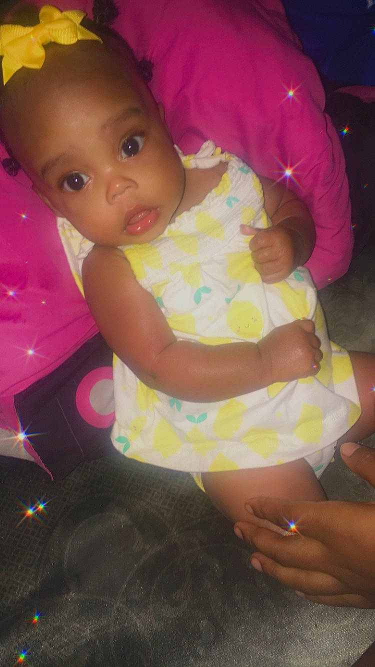 Khloe joined the competition — help win amazing prizes! baby, baby_toddler_clothing, cheek, eye, finger, fun, hand, happy, human_leg, lap, leg, lip, magenta, nail, person, pink, purple, skin, thigh, thumb