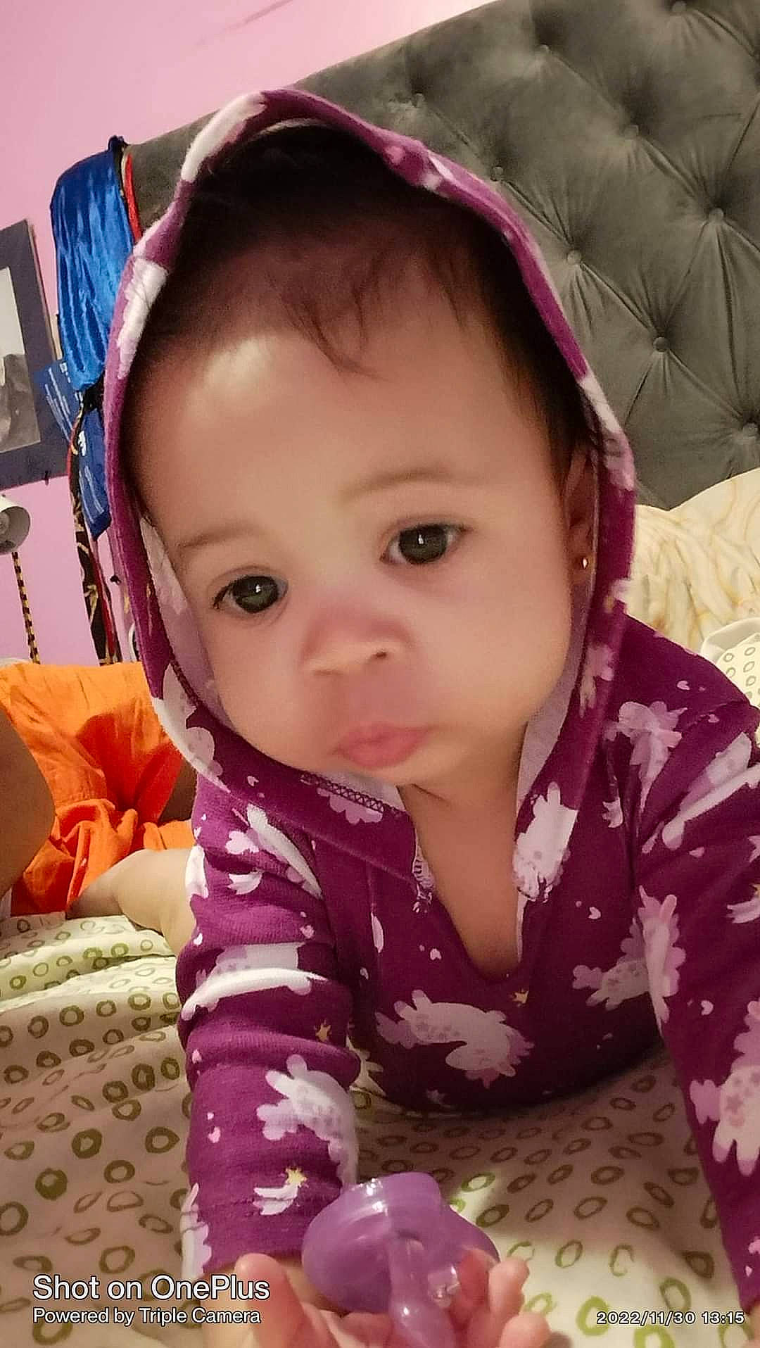 Gianna Storm is registered to the contest to win money with this photo: baby, baby_toddler_clothing, cheek, chin, comfort, cool, eyebrow, eyelash, facial_expression, happy, iris, lip, nose, outerwear, person, pink, purple, skin, sleeve, textile