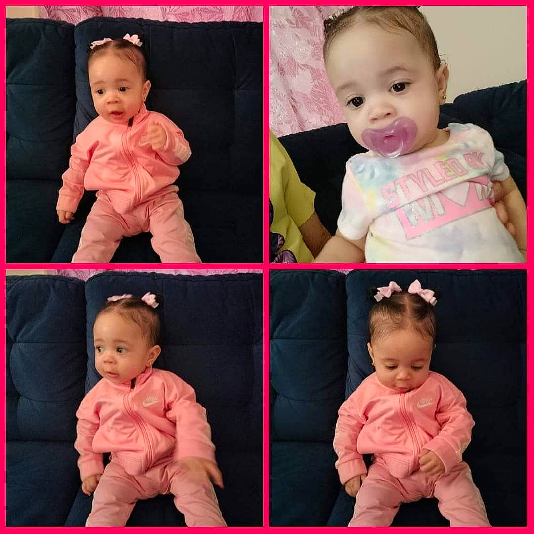 Stormy is registered to the contest to win money with this photo: arm, baby, baby_toddler_clothing, cheek, clothing, collar, face, facial_expression, gesture, magenta, neck, outerwear, person, photograph, pink, product, purple, sleeve, standing, toddler