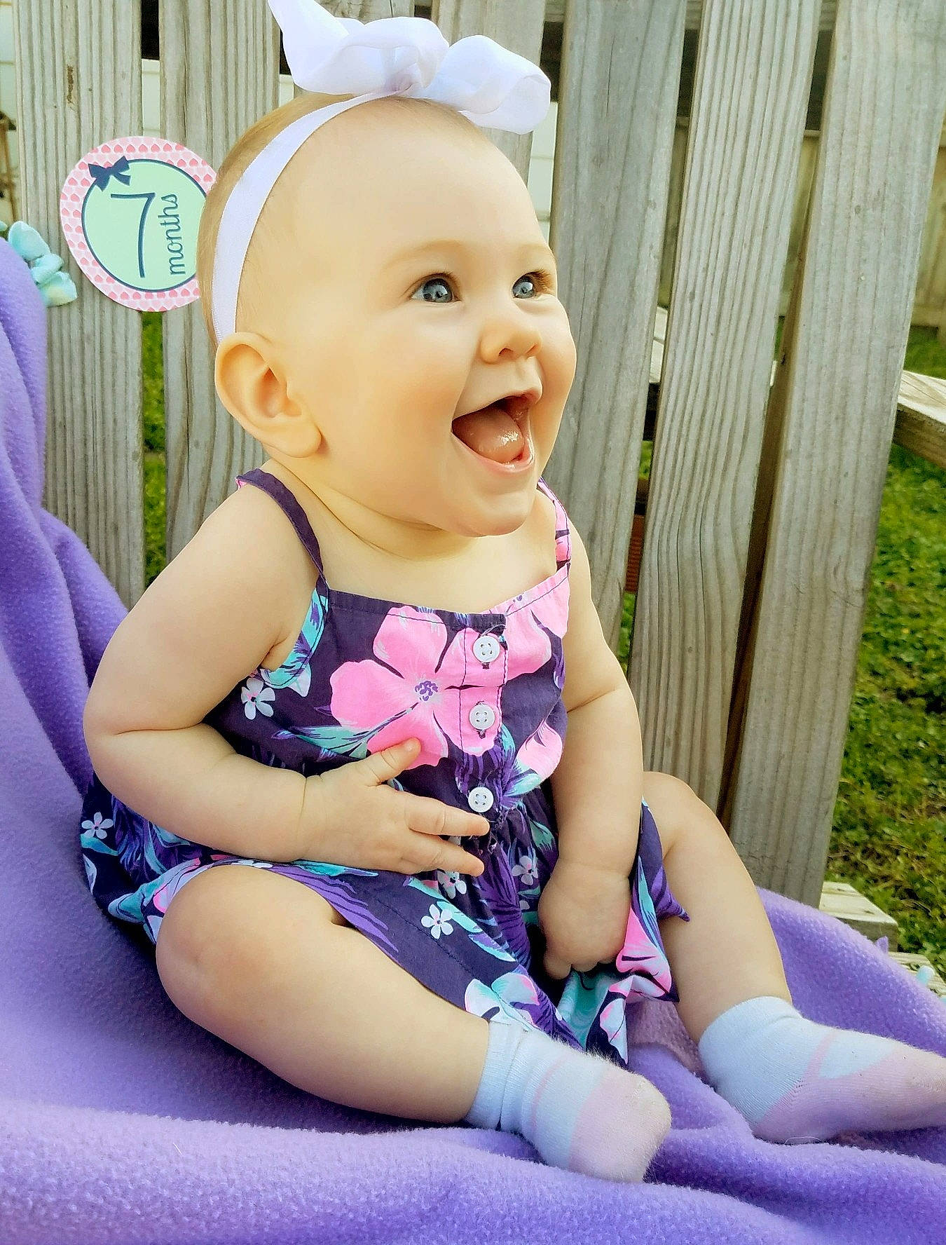 Rylie joined the competition — help win amazing prizes! baby_products, child, day, eye, facial_expression, fun, girl, hair_accessory, happiness, headgear, infant, leg, material, person, pink, product, purple, sitting, skin, smile