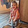 Iris a rejoint le concours — aidez-le/la à gagner de superbes lots ! child, toddler, smiling, pot, kitchen, wooden_floor, pigtails, clothing, indoor, playful, happy, person, metal_pot, cooking, home, jacket, cabinet, flooring, cute, sitting