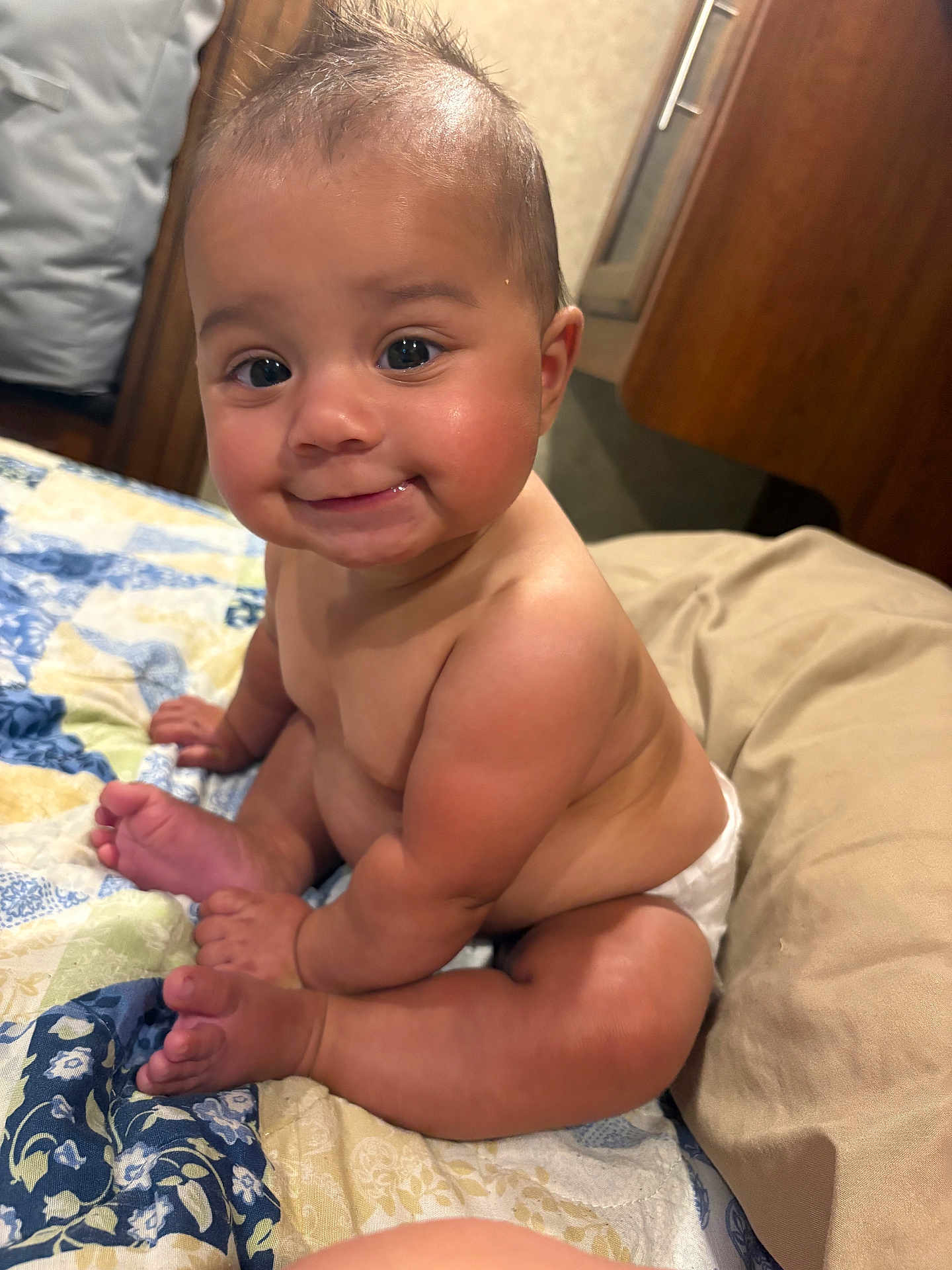 Emelia joined the competition — help win amazing prizes! baby, child, smile, skin, diaper, sitting, bed, quilt, foot, hand, cute, indoors, expression, portrait, chubby, infant, bare_skin, happy, face, person