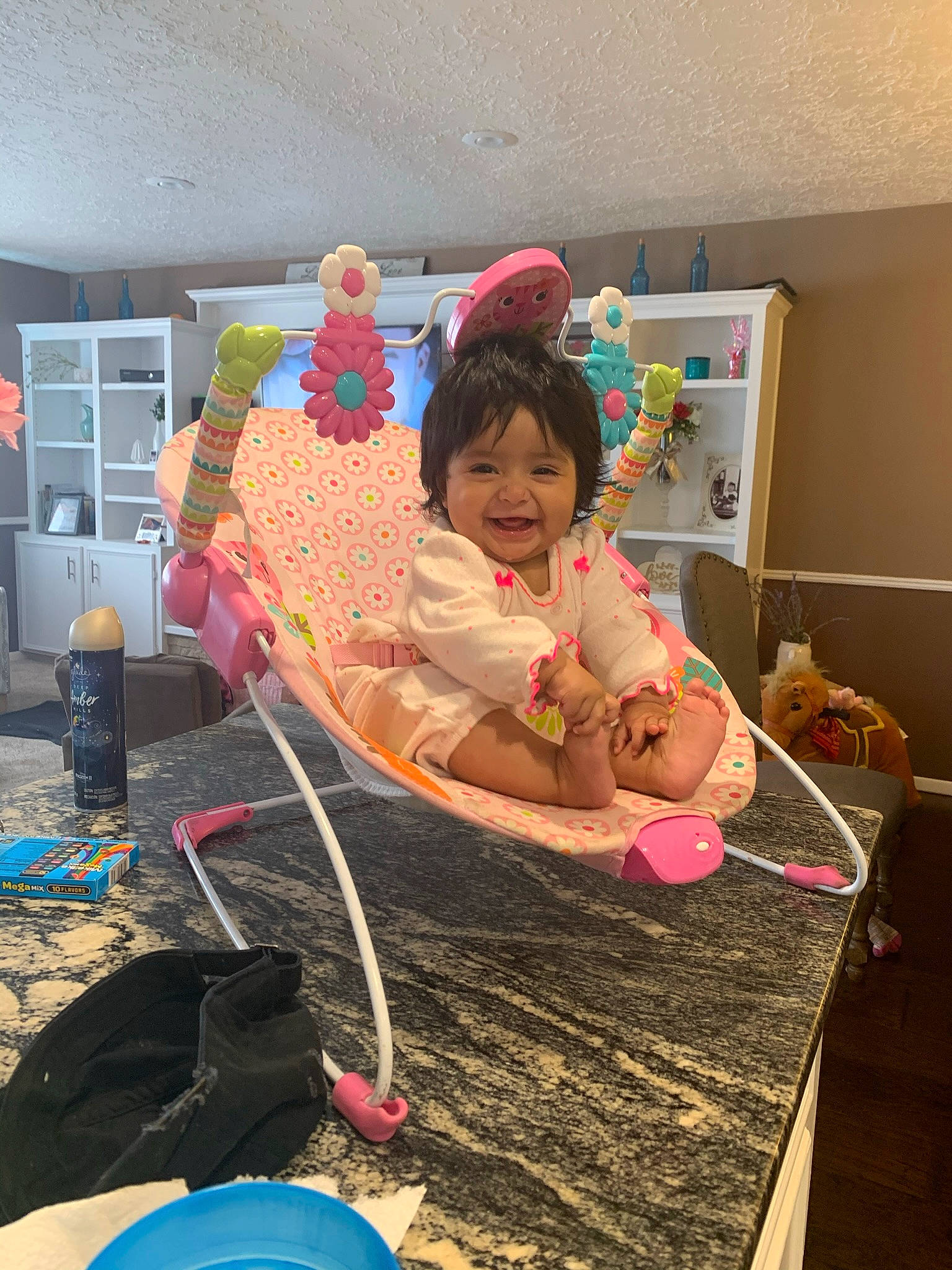 Lola joined the competition — help win amazing prizes! baby, baby_toddler_clothing, baby_toys, child, flooring, fun, hat, joy, magenta, party, person, play, room, sitting, smile, stuffed_toy, thread, toddler, toy