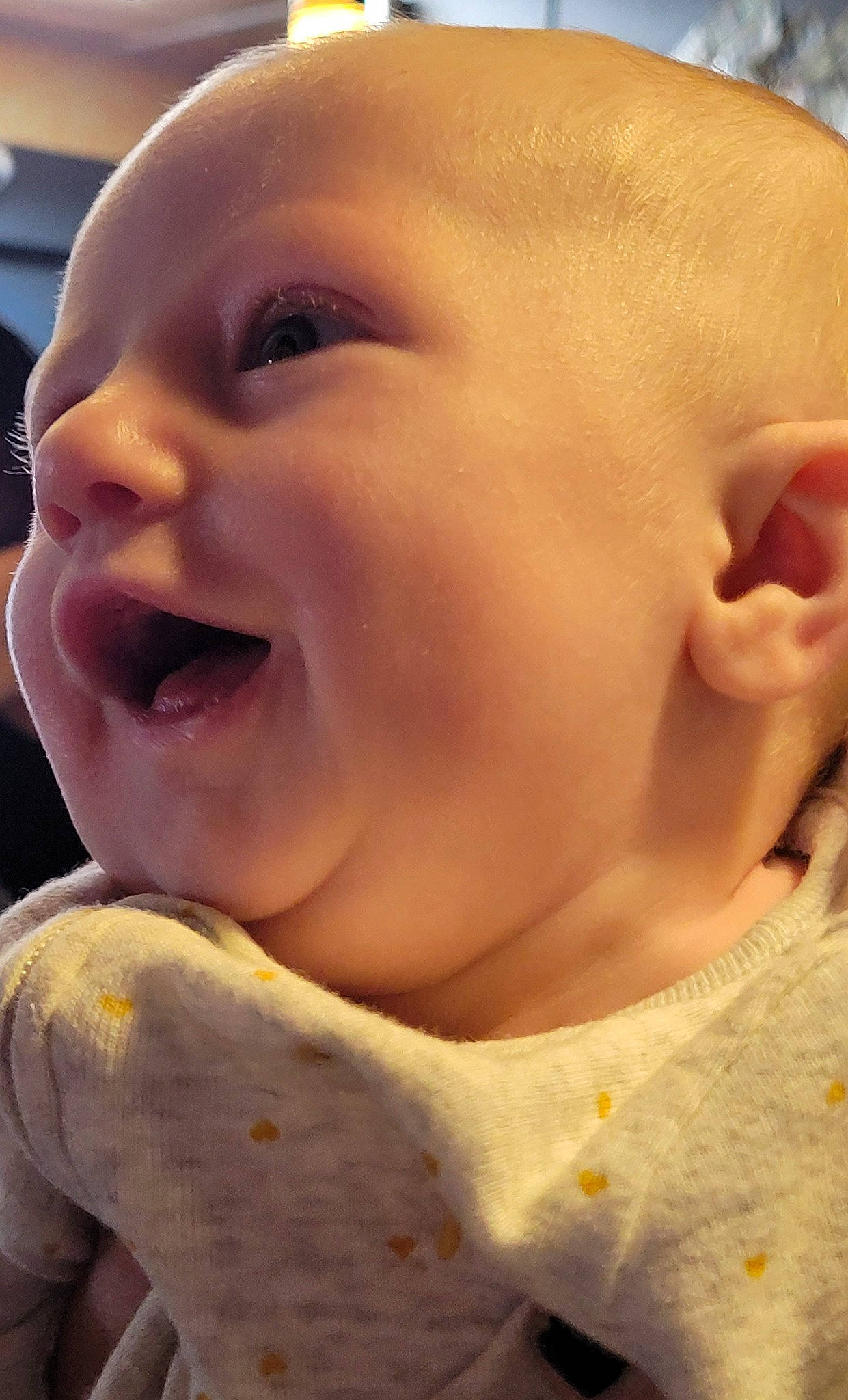 Emmie is registered to the contest to win money with this photo: baby, cheek, chin, ear, eye, eyebrow, eyelash, face, facial_expression, forehead, gesture, happy, head, iris, lip, mouth, neck, nose, person, skin