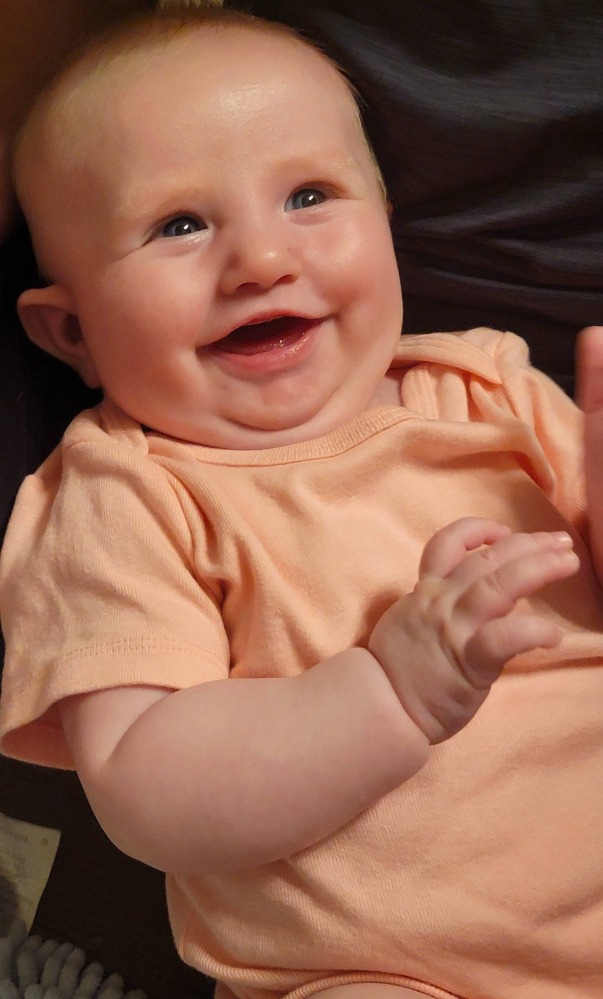 Emmie joined the competition — help win amazing prizes! baby, baby_toddler_clothing, cheek, chin, comfort, eye, finger, flash_photography, gesture, hand, happy, iris, joy, lip, mouth, nose, person, skin, sleeve, smile