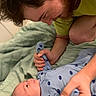 River joined the competition — help win amazing prizes! baby, beard, bed, blanket, caring, child, clothing, face, hand, happy, indoor, interaction, love, man, onesie, parent, person, portrait, smile, toddler