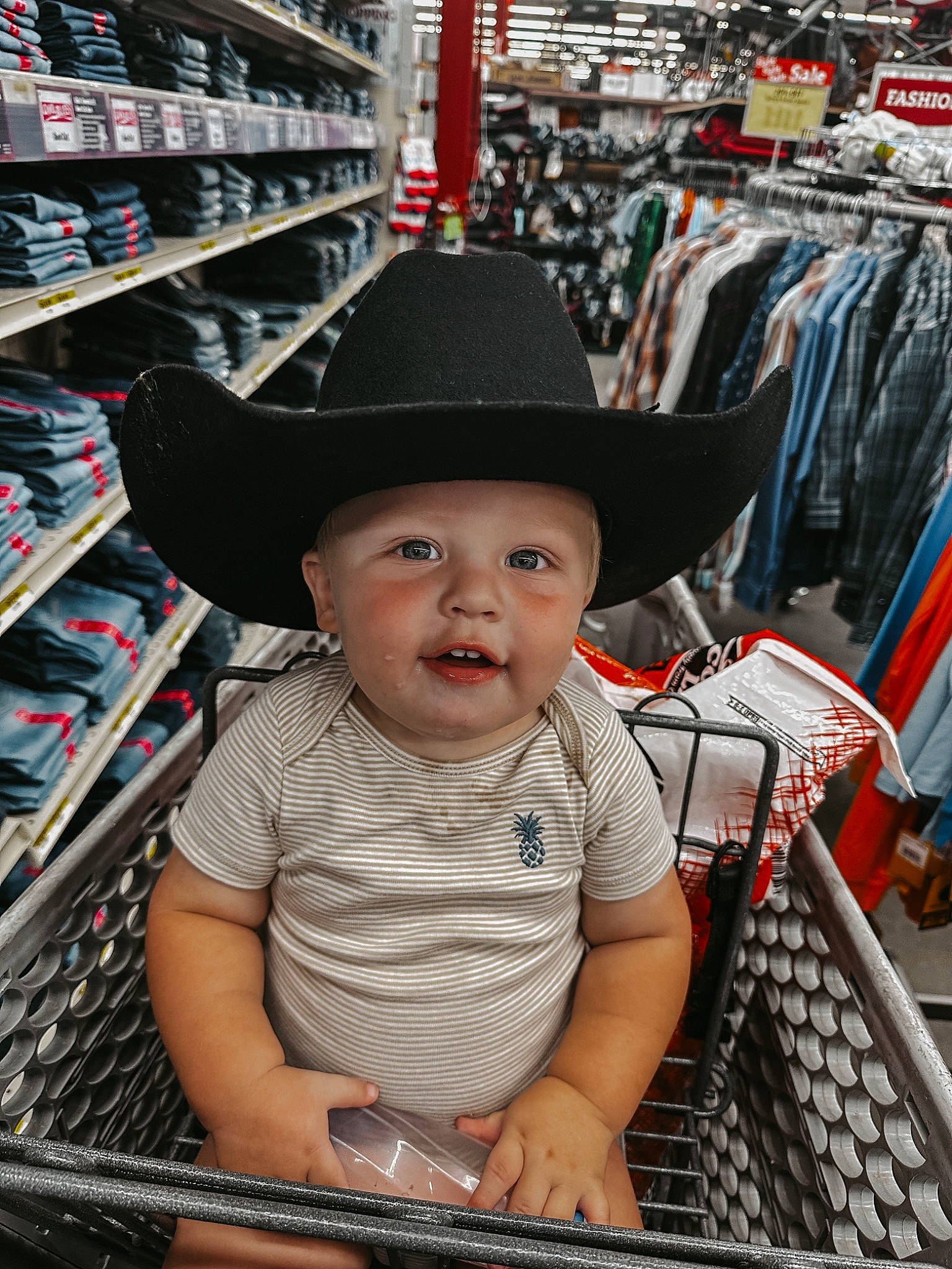 Montgomery joined the competition — help win amazing prizes! bookcase, cap, child, costume_hat, customer, fashion_accessory, fedora, fun, hat, headgear, headwear, market, person, product, publication, retail, shelf, shelving, shopping, snapshot