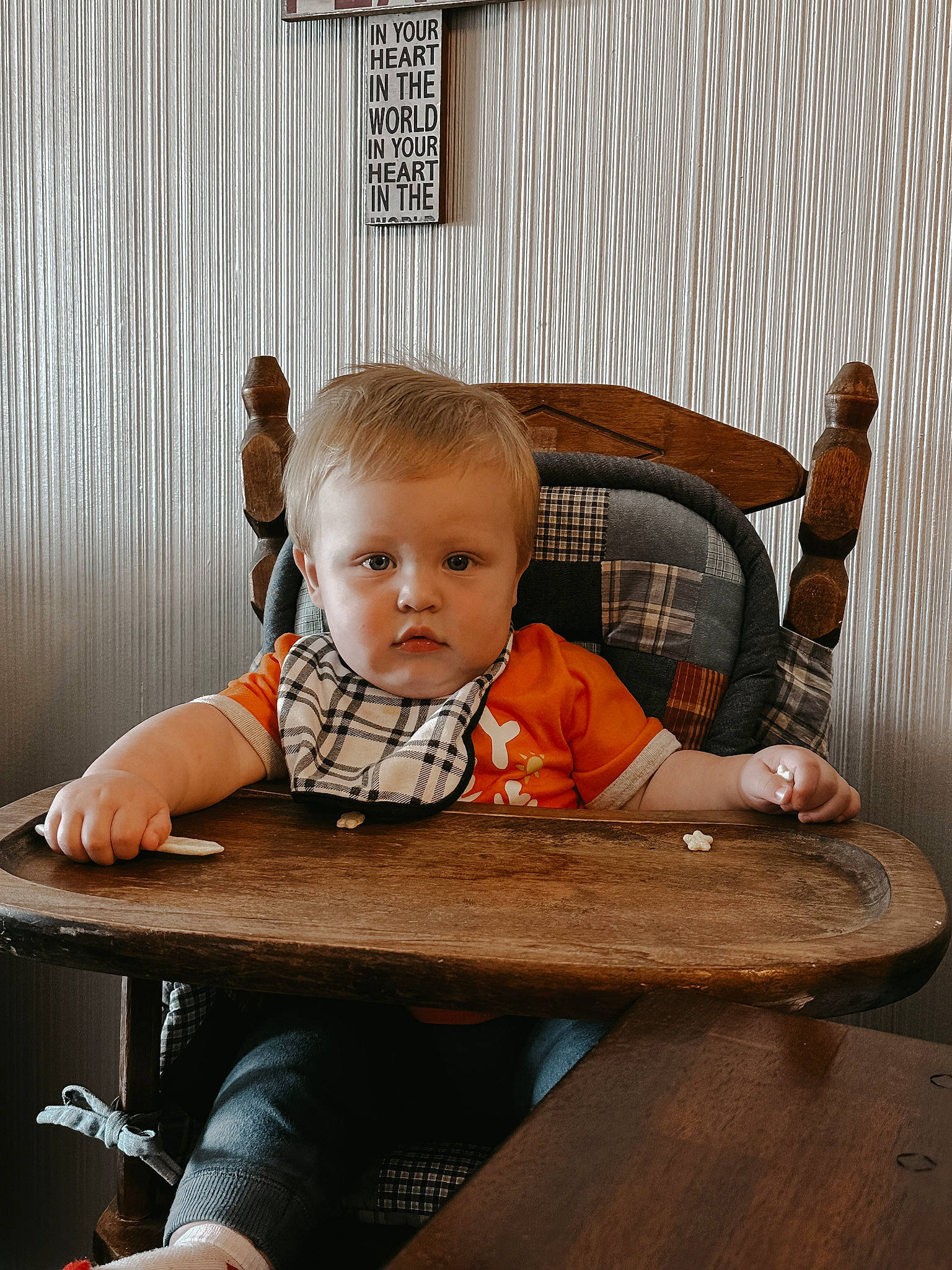 Montgomery is registered to the contest to win money with this photo: baby, baby_products, baby_toddler_clothing, chair, child, comfort, flash_photography, flooring, furniture, hardwood, leisure, outdoor_furniture, pattern, person, portrait_photography, room, sitting, t_shirt, table, toddler