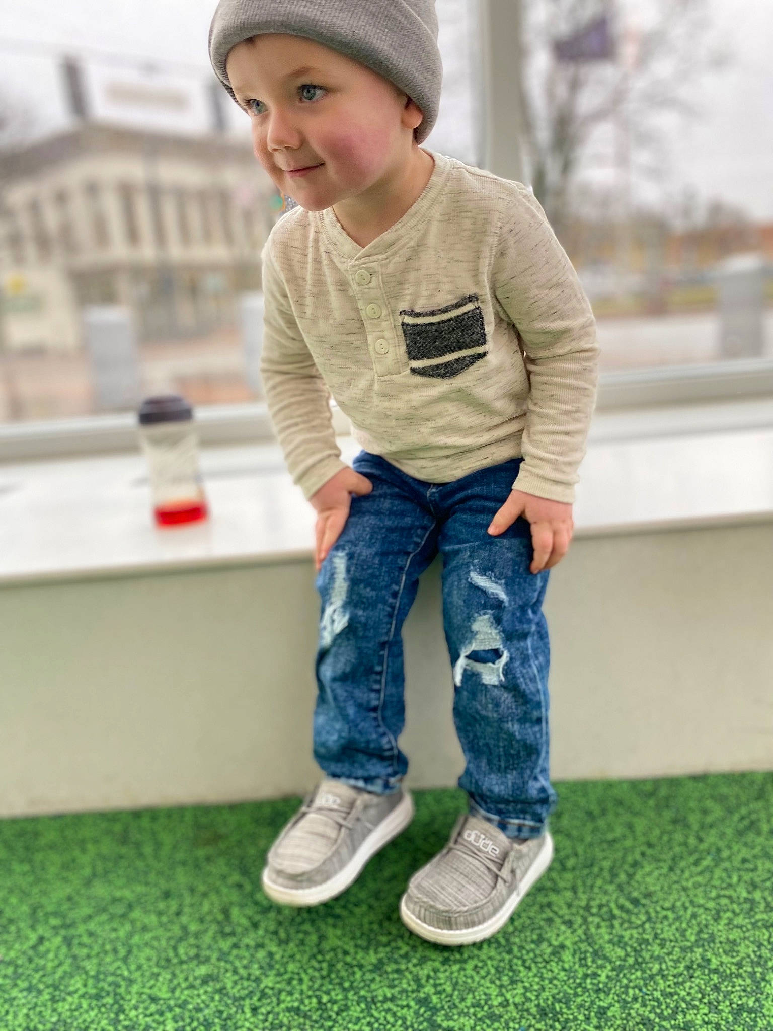 Brantley is registered to the contest to win money with this photo: baby_toddler_clothing, cap, child, cool, denim, electric_blue, face, fun, grey, happy, headwear, jeans, joint, joy, knee, leisure, person, skin, sleeve, smile