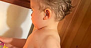Ozias joined the competition — help win amazing prizes! toddler, child, indoor, wooden_wall, toy, curious, wet_hair, side_profile, skin, arm, shoulder, window, daylight, baby, playtime, colorful, candid, young_child, person, light