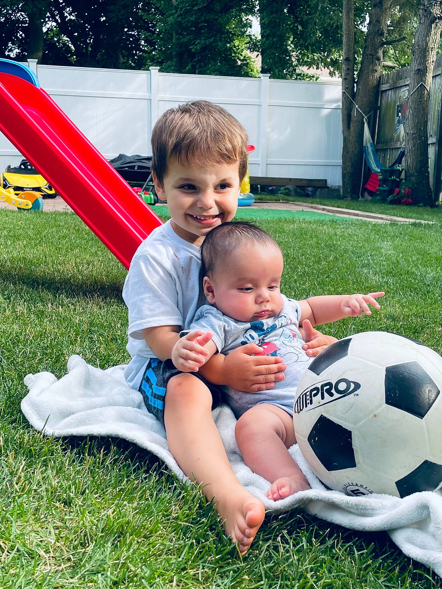 Maxwell joined the competition — help win amazing prizes! ball, football, fun, grass, green, happy, joy, leaf, leg, leisure, people_in_nature, person, plant, recreation, shorts, smile, sneakers, soccer, sports_equipment, summer