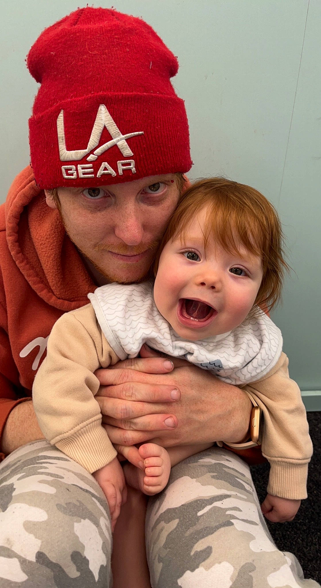 Mayah is registered to the contest to win money with this photo: baby, cap, cheek, child, comfort, eye, face, fun, gesture, happy, hat, head, headgear, headwear, human_body, joy, lip, mouth, person, santa_claus