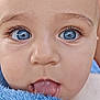 baby, blue_eyes, child, close_up, cute, expression, eyebrows, eyelashes, face, head, infant, innocence, mouth, person, portrait, skin, soft_texture, tongue, towel, young