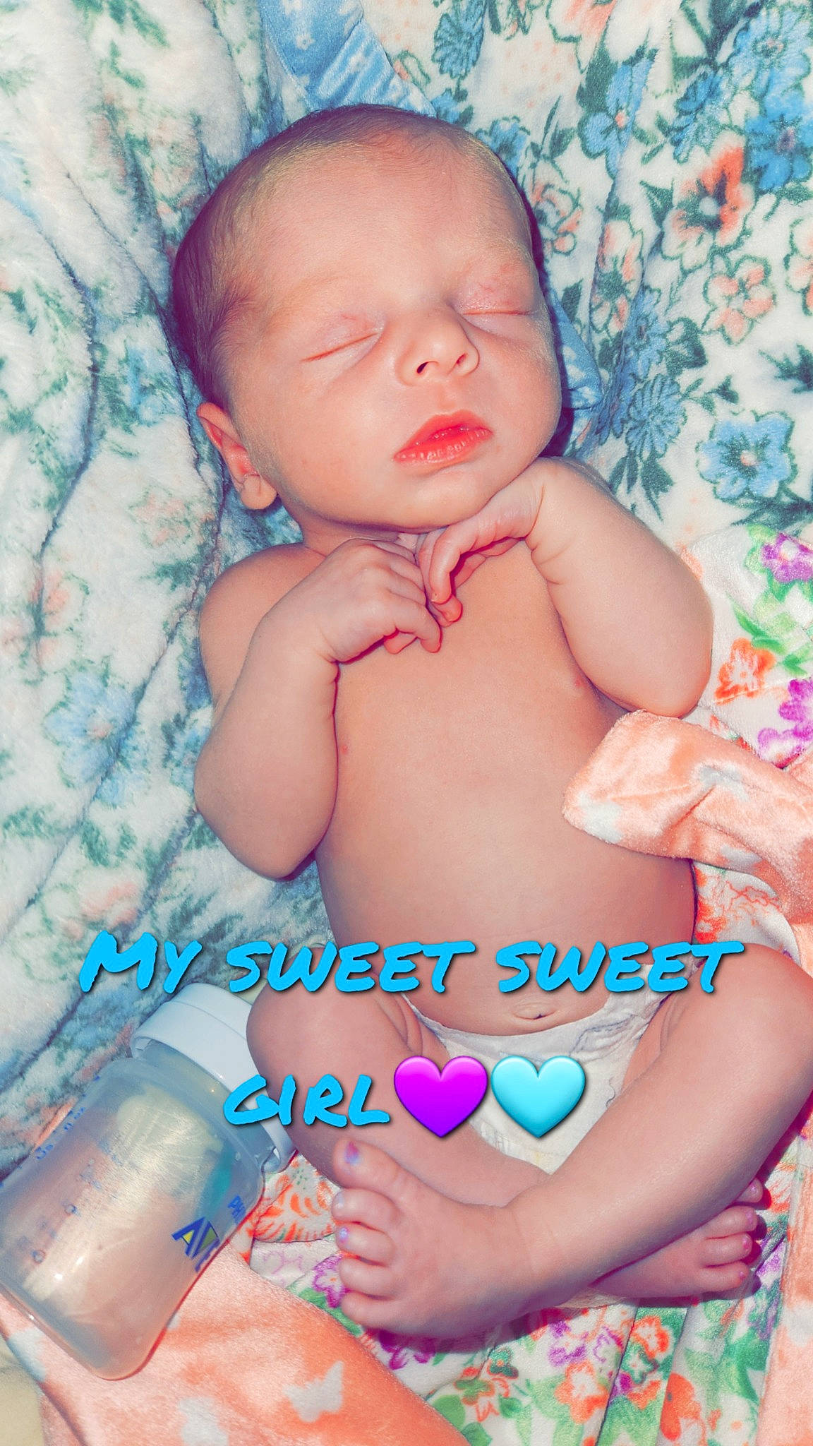 Amira is registered to the contest to win money with this photo: aqua, azure, baby, baby_toddler_clothing, blue, cheek, child, comfort, finger, happy, human, mouth, muscle, nail, person, pink, product, skin, stomach, thumb