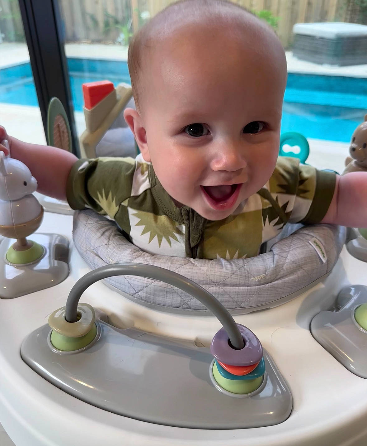 Collin is registered to the contest to win money with this photo: audio_equipment, auto_part, automotive_design, automotive_wheel_system, baby, baby_toddler_clothing, cheek, child, circle, fun, iris, leisure, person, product, sitting, skin, smile, steering_wheel, toddler, vacation