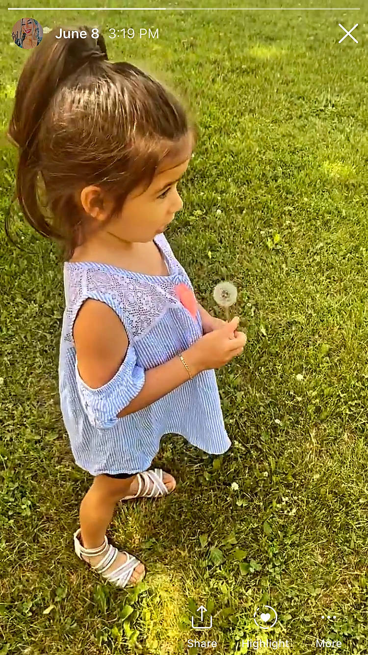 Isabella joined the competition — help win amazing prizes! baby_toddler_clothing, child, fun, gesture, grass, grass_family, grassland, hand, happy, lawn, leisure, meadow, pattern, people_in_nature, person, plant, play, sitting, soil, summer