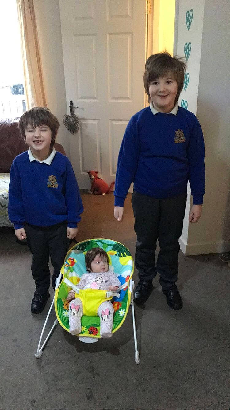 Mercedes is registered to the contest to win money with this photo: baby, baby_products, baby_toddler_clothing, blue, child, door, electric_blue, event, flooring, fun, head, joy, motor_vehicle, person, plastic, play, room, shorts, sleeve, smile