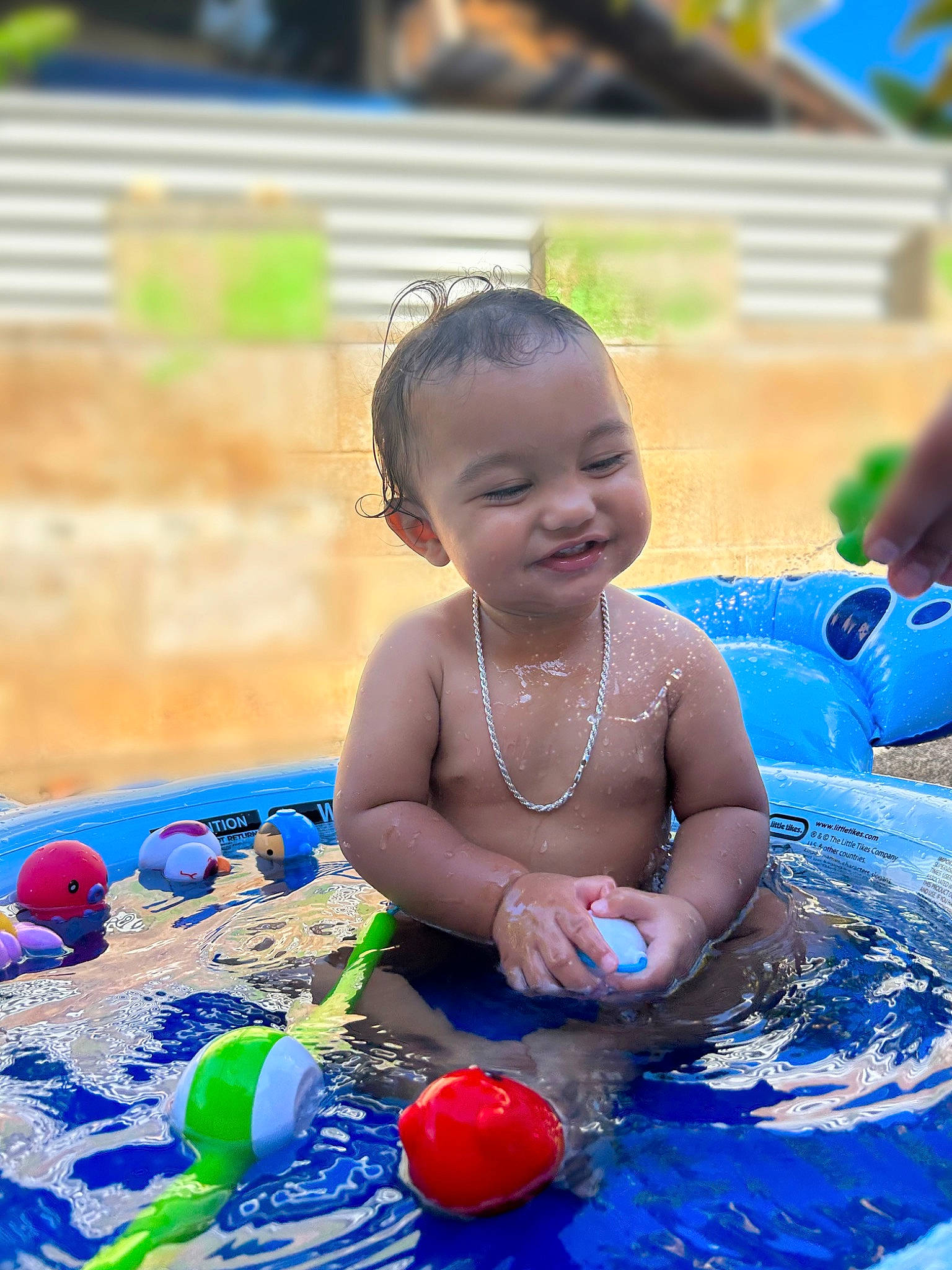 Zaiyden joined the competition — help win amazing prizes! baby, bathing, child, electric_blue, event, facial_expression, fun, grass, happy, joy, leisure, liquid_bubble, party, person, play, recreation, sitting, smile, toddler, toy