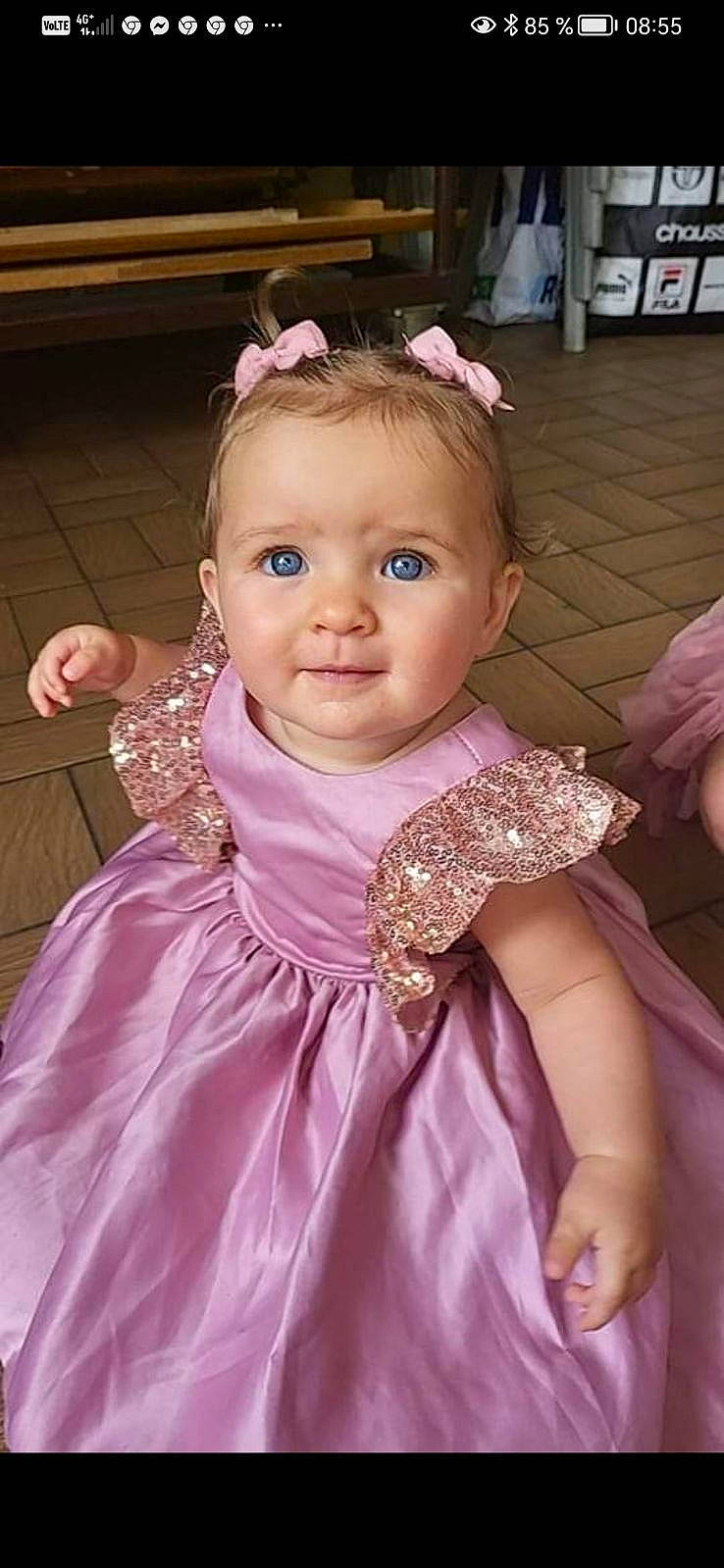 Leïa a rejoint le concours — aidez-le/la à gagner de superbes lots ! baby_toddler_clothing, cheek, child, day_dress, dress, embellishment, eyelash, facial_expression, fashion, fun, hairstyle, happy, headgear, iris, one_piece_garment, person, pink, purple, skin, sleeve