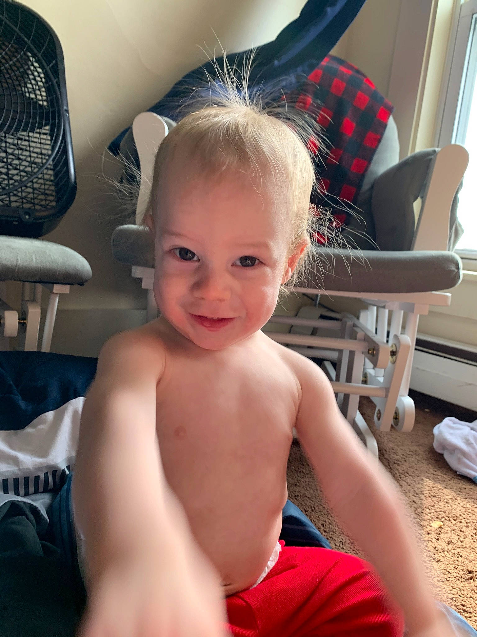 Bradley is registered to the contest to win money with this photo: arm, blond, cheek, child, ear, eye, face, finger, hair, hairstyle, head, joint, joy, leg, lip, nose, organ, person, shoulder, sitting