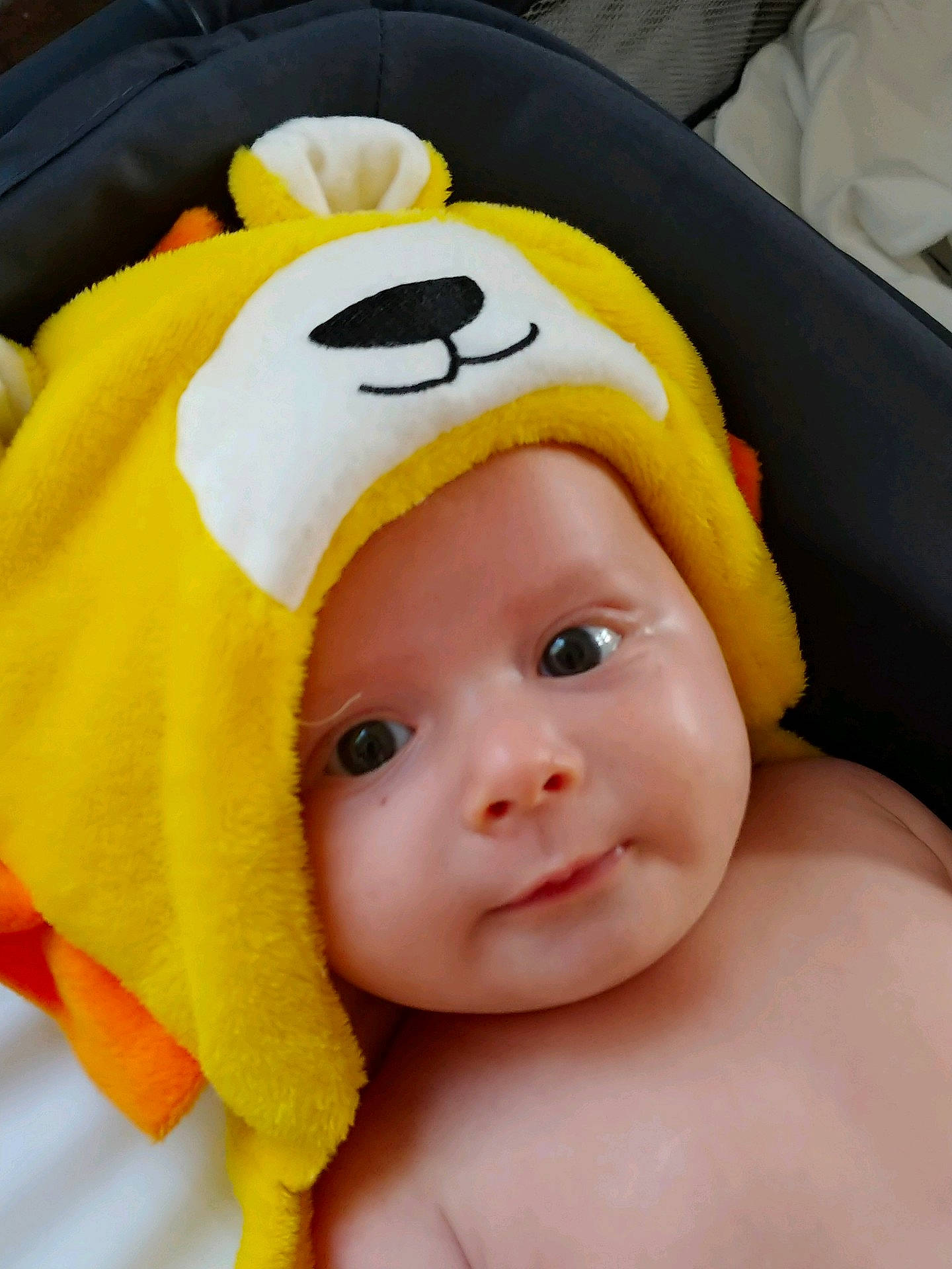Troy is registered to the contest to win money with this photo: cap, cheek, child, ear, face, hair_accessory, head, headgear, infant, nose, person, product, smile, toddler, yellow