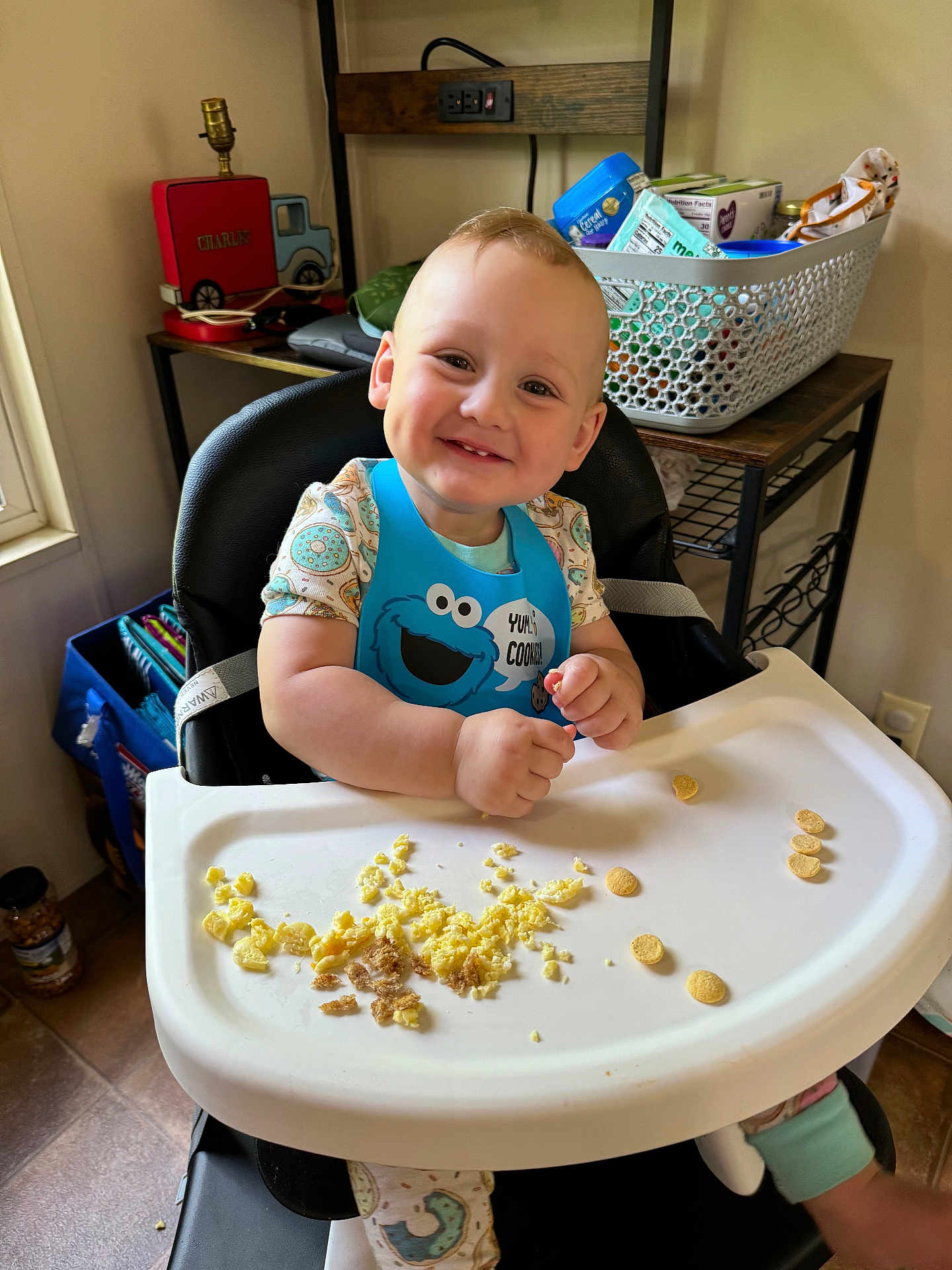 Charles is registered to the contest to win money with this photo: accessories, adult, baby, bag, bodypart, cooking, cutlery, face, finger, food, furniture, hand, handbag, head, male, man, mashingfood, person, photography, portrait