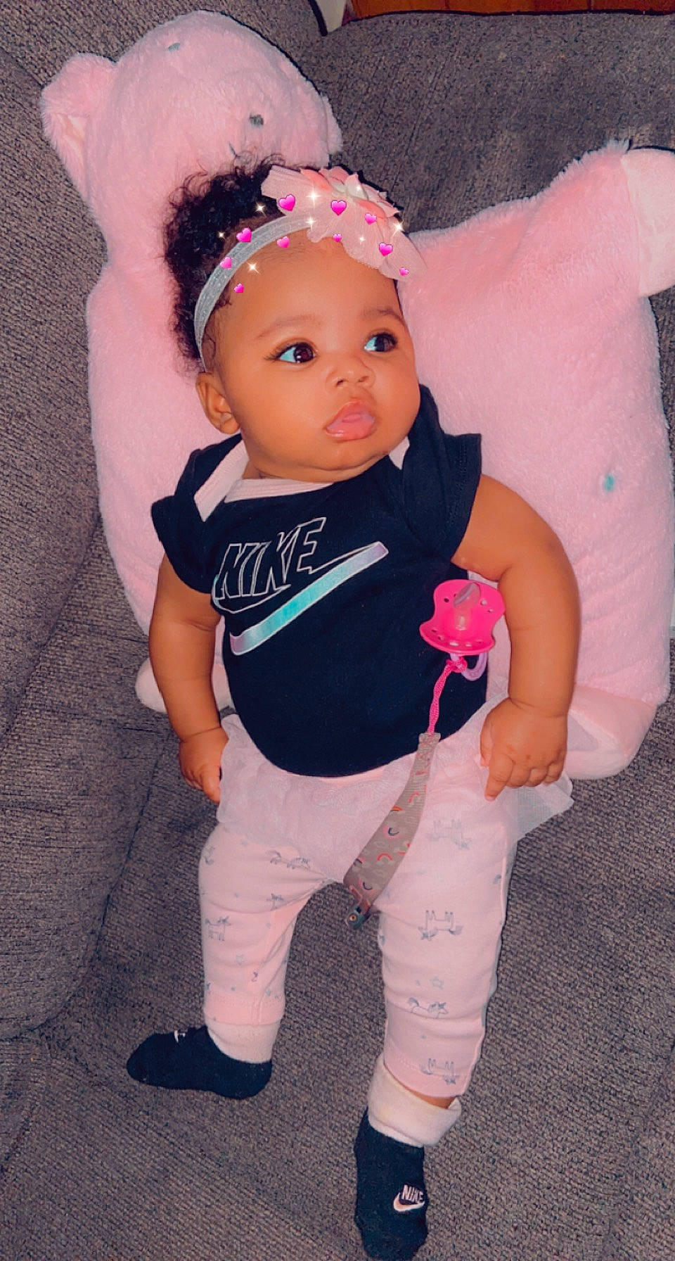 Alaiah joined the competition — help win amazing prizes! baby_toddler_clothing, cheek, eye, finger, head, headgear, headpiece, headwear, joint, knee, lip, magenta, outerwear, person, pink, skin, sleeve, sock, textile, thigh