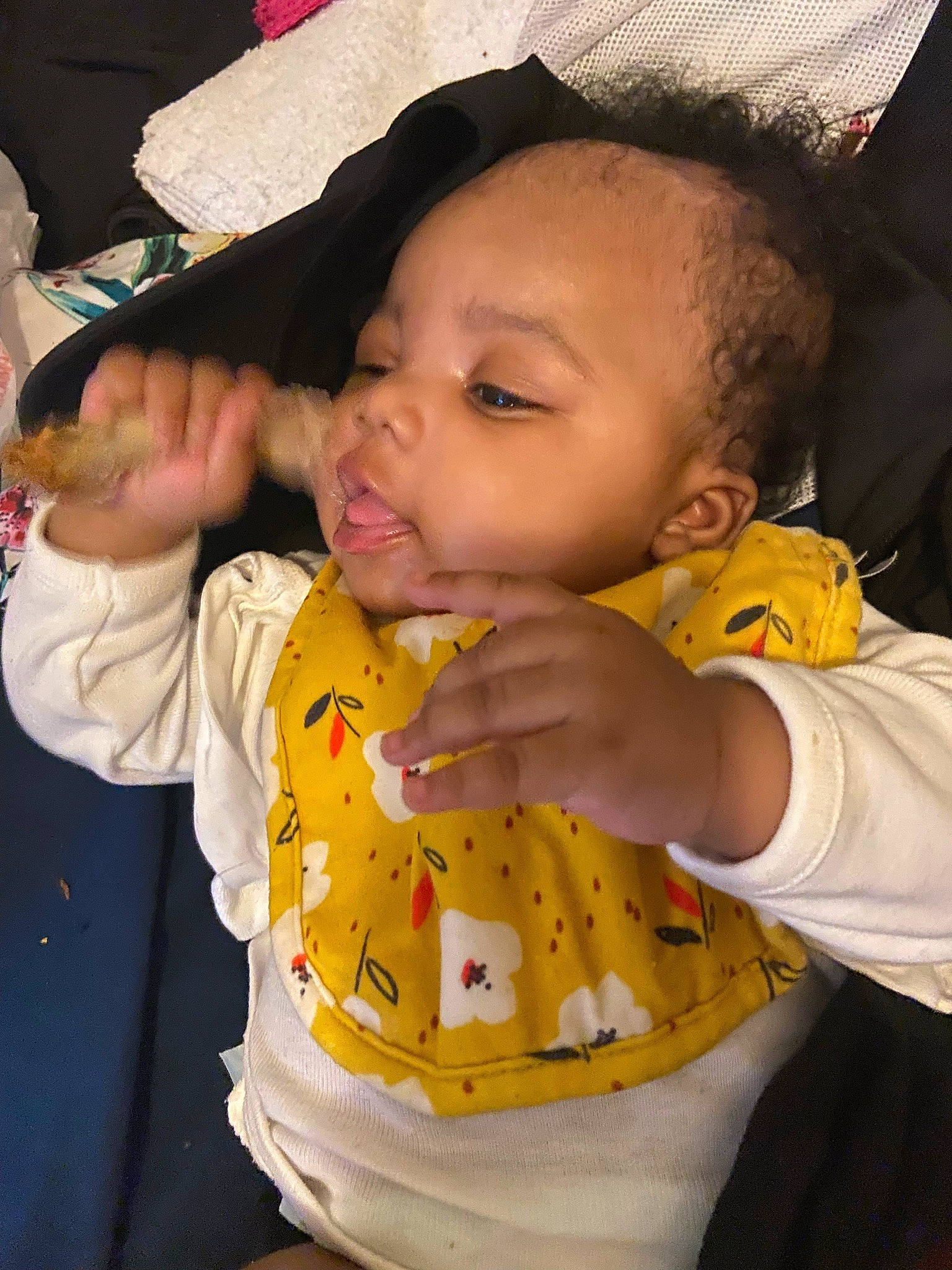 Alaiah is registered to the contest to win money with this photo: baby, baby_toddler_clothing, cheek, child, chin, eye, eyelash, finger, fun, gesture, happy, headgear, human_body, lip, mouth, nose, person, pink, skin, sleeve