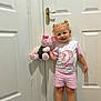 Delilah-mae joined the competition — help win amazing prizes! birthday, blonde_hair, carpet, celebration, child, cute, door, happy, indoor, number_two, pigtails, pink_clothing, plush_toy, portrait, shorts, smiling, standing, toddler, toy, tshirt