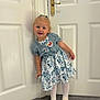 birthday, birthday_badge, blue, bow, cardigan, carpet, child, cute, door, dress, floor, girl, happy, indoor, person, shoes, smile, standing, tights, two_years_old
