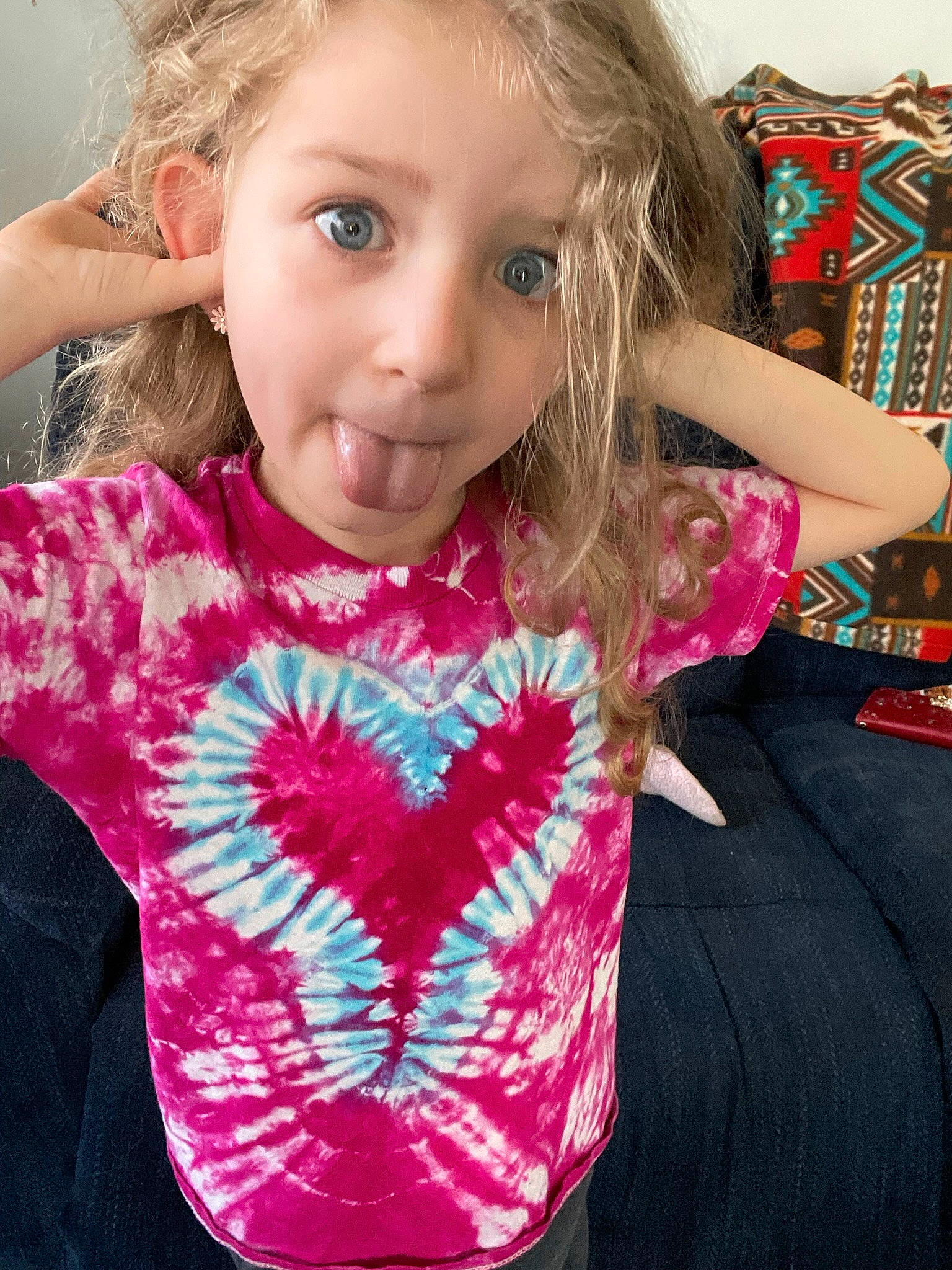 Emory-ann is registered to the contest to win money with this photo: arm, baby_toddler_clothing, cheek, eye, eyelash, face, facial_expression, hair, hairstyle, hand, head, iris, lip, neck, organ, outerwear, person, product, shoulder, skin