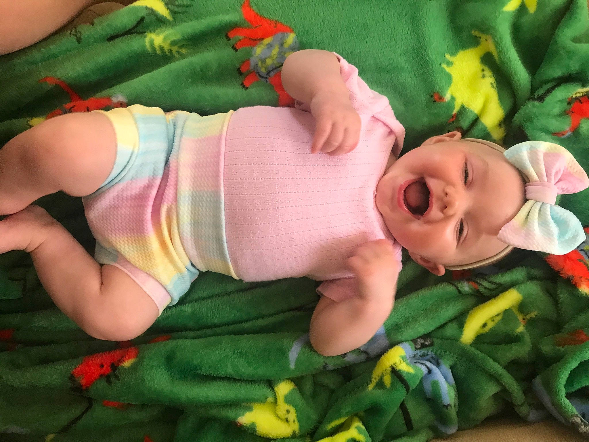 Cali May joined the competition — help win amazing prizes! abdomen, baby, baby_toddler_clothing, chest, child, finger, fun, grass, green, happy, headwear, knee, muscle, navel, person, pink, plant, stomach, thigh, toddler