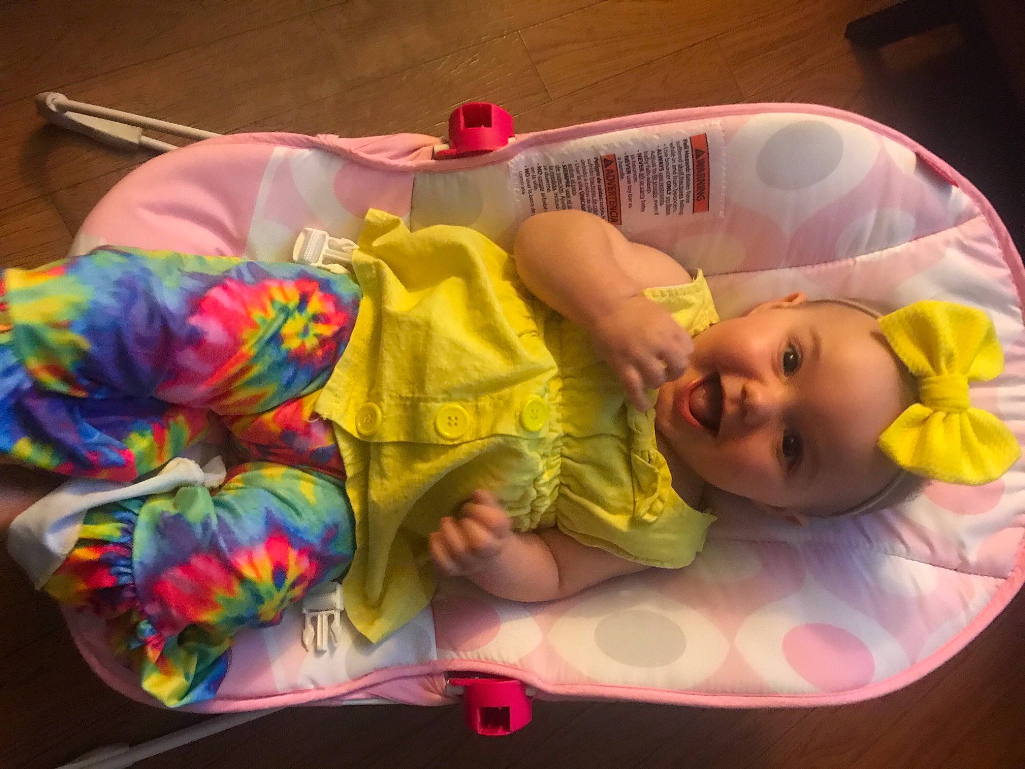 Cali May joined the competition — help win amazing prizes! arm, baby, baby_products, baby_toddler_clothing, bed, child, comfort, facial_expression, finger, fun, happy, head, headgear, human_body, linens, magenta, person, pink, room, skin