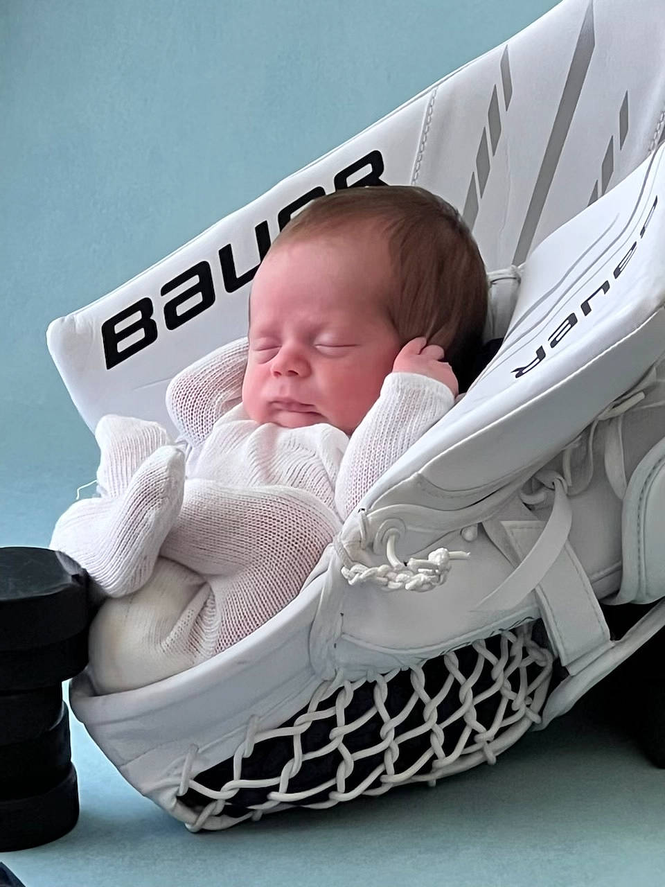 Leonidas is registered to the contest to win money with this photo: automotive_design, automotive_exterior, automotive_wheel_system, baby, baby_carriage, baby_products, baby_safety, baby_sleeping, car_seat, carmine, child, comfort, hat, linens, nap, pattern, person, sitting, sleep, textile