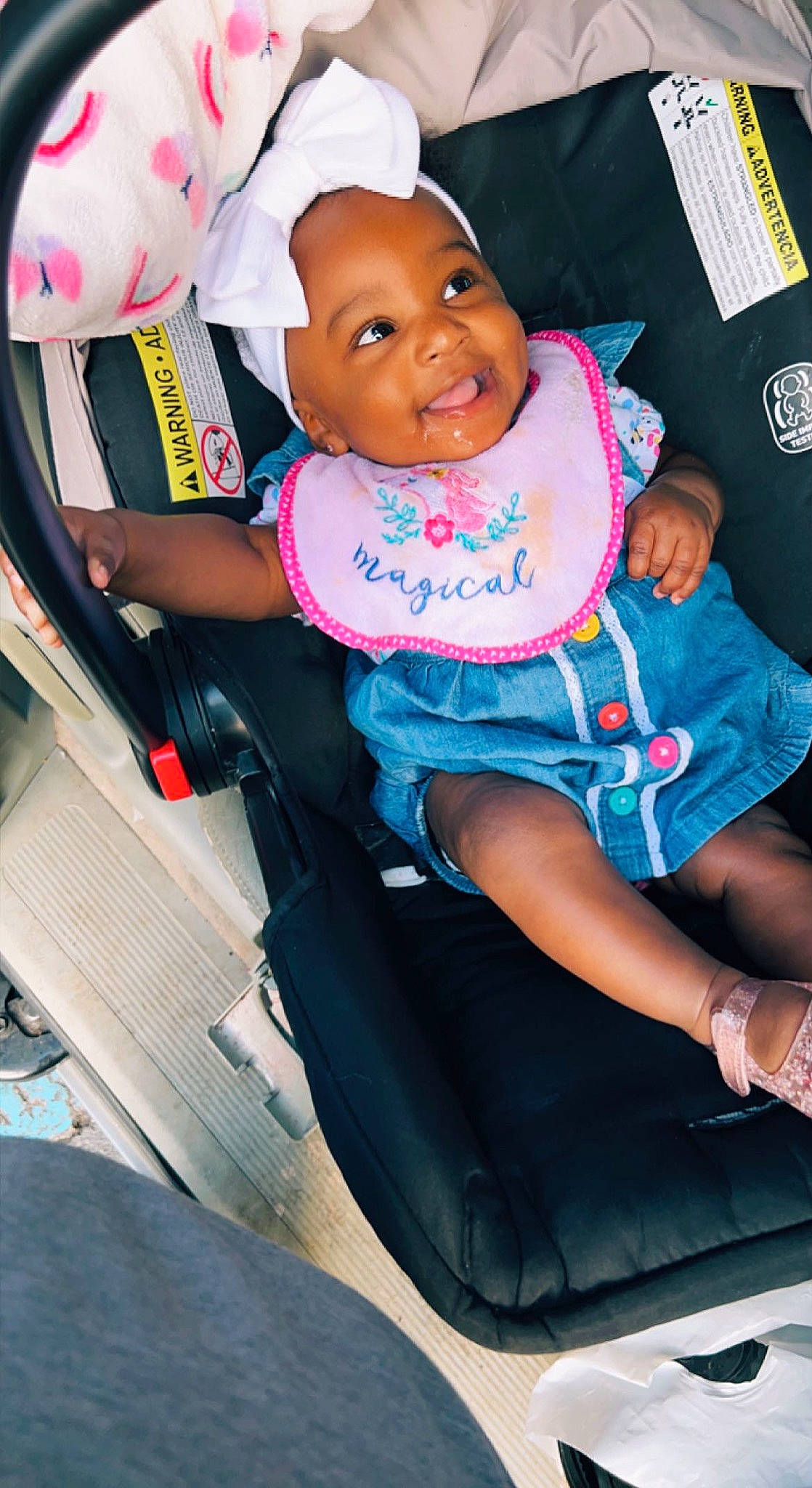 Blessyn is registered to the contest to win money with this photo: auto_part, baby, baby_carriage, baby_in_car_seat, baby_toddler_clothing, baseball_cap, cap, car_seat, child, clothing, happy, human_leg, joy, person, pink, shorts, smile, t_shirt, thigh, toddler
